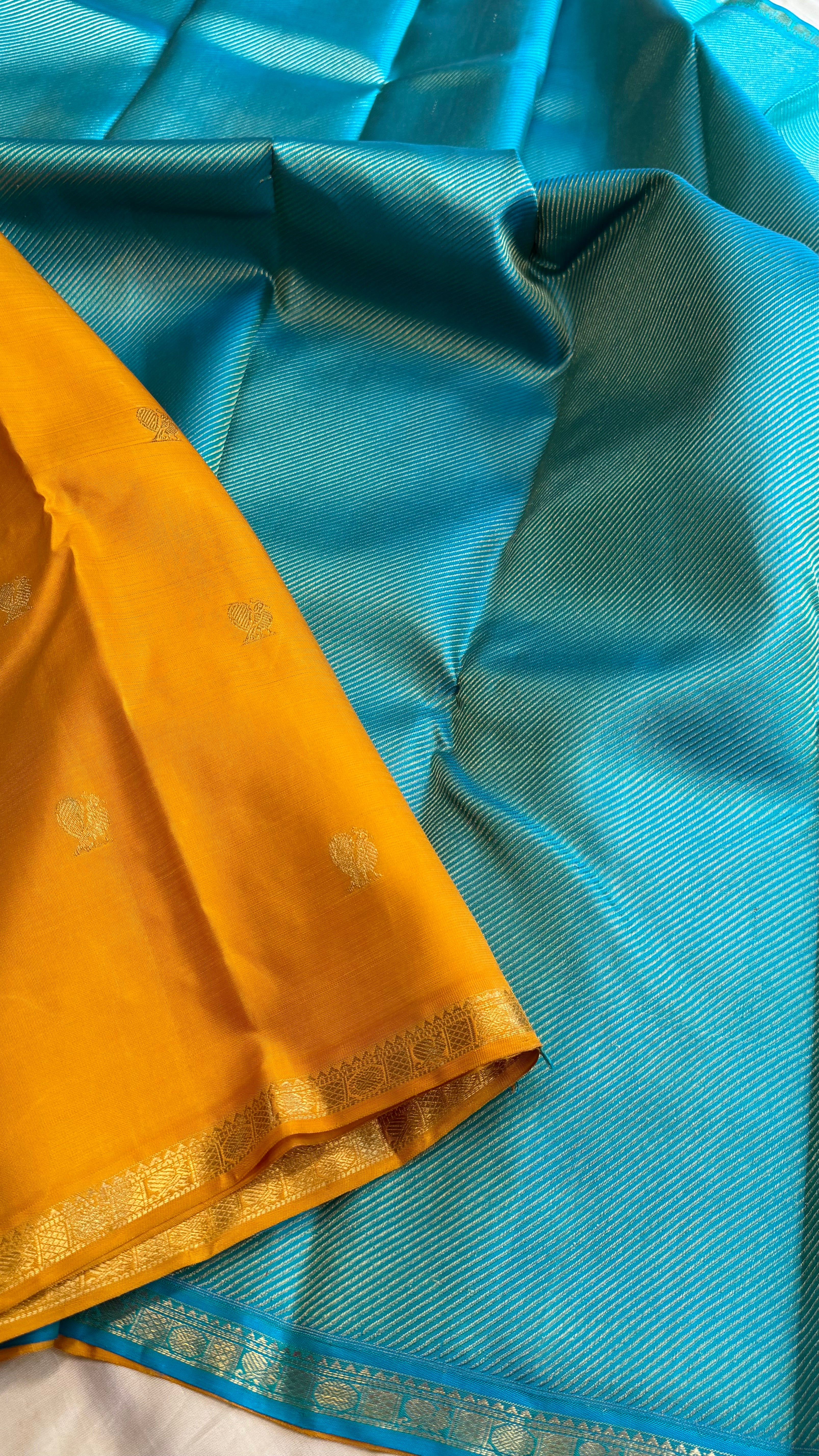 Golden mustard and turquoise blue lehariya partly pallu style - kanjipuram silk