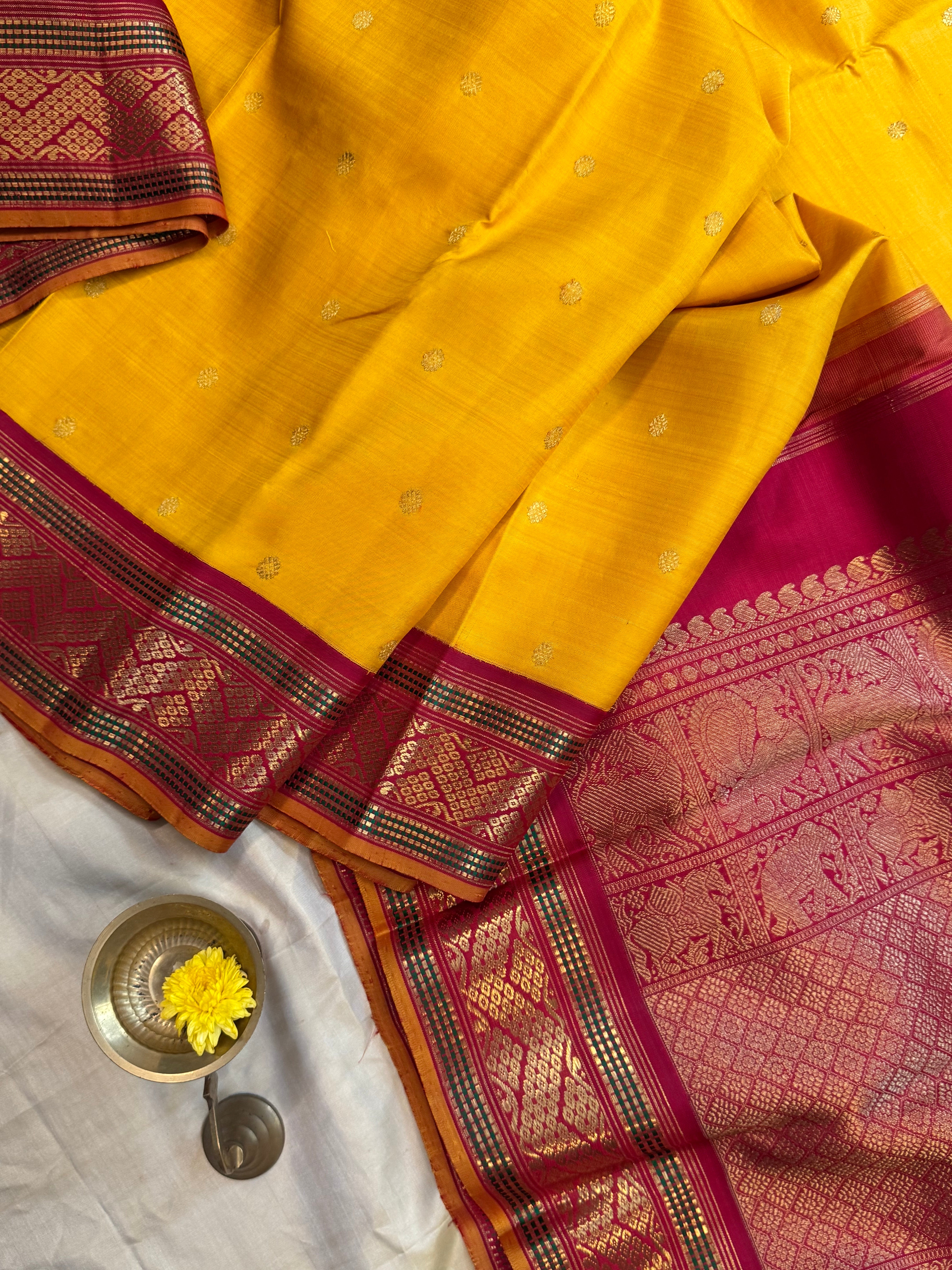 Mustard yellow vintage style adai pet kanjipuram silk.