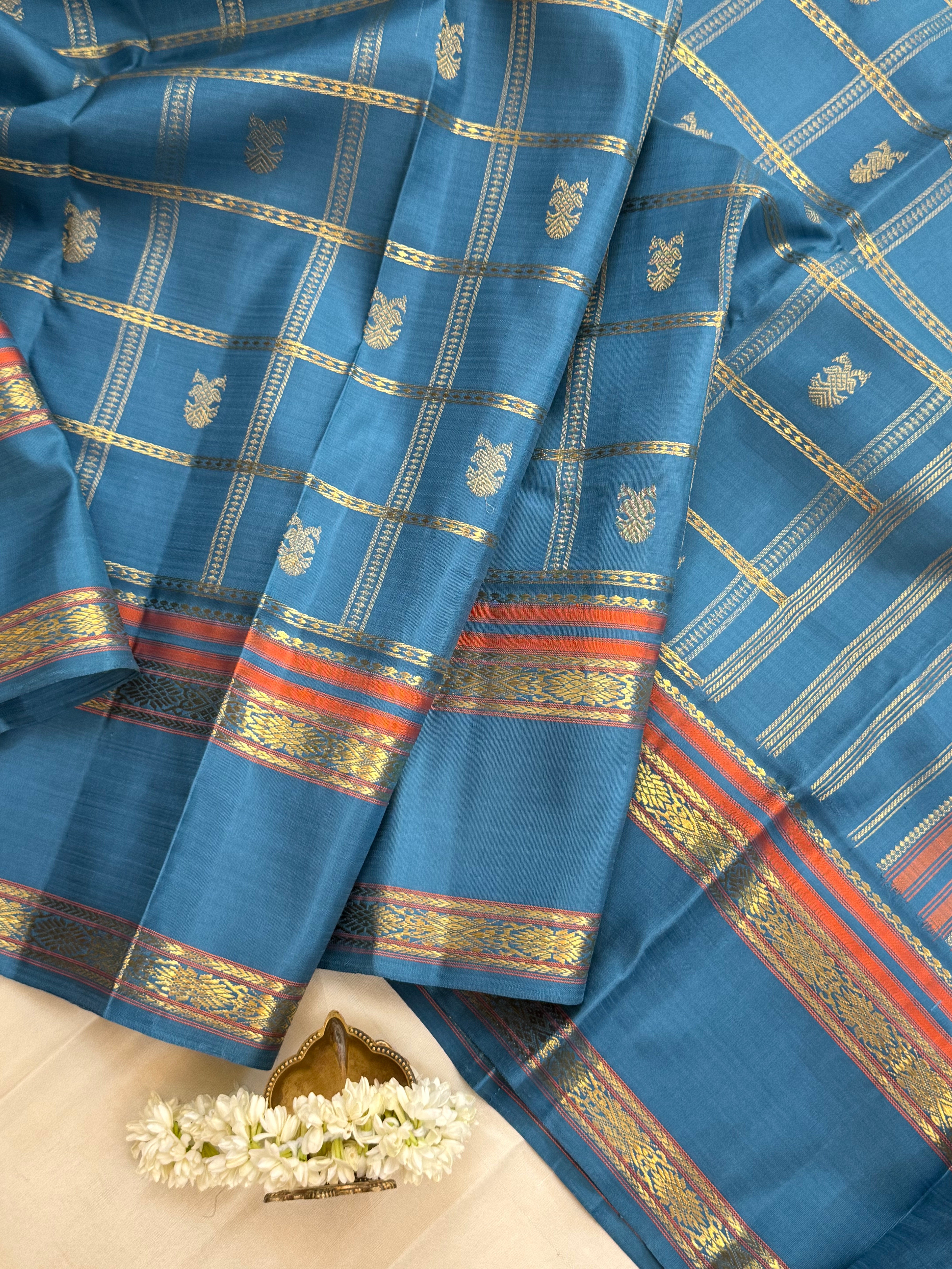 Master weaver Powder blue Kattam Butta Kanjipuram silk