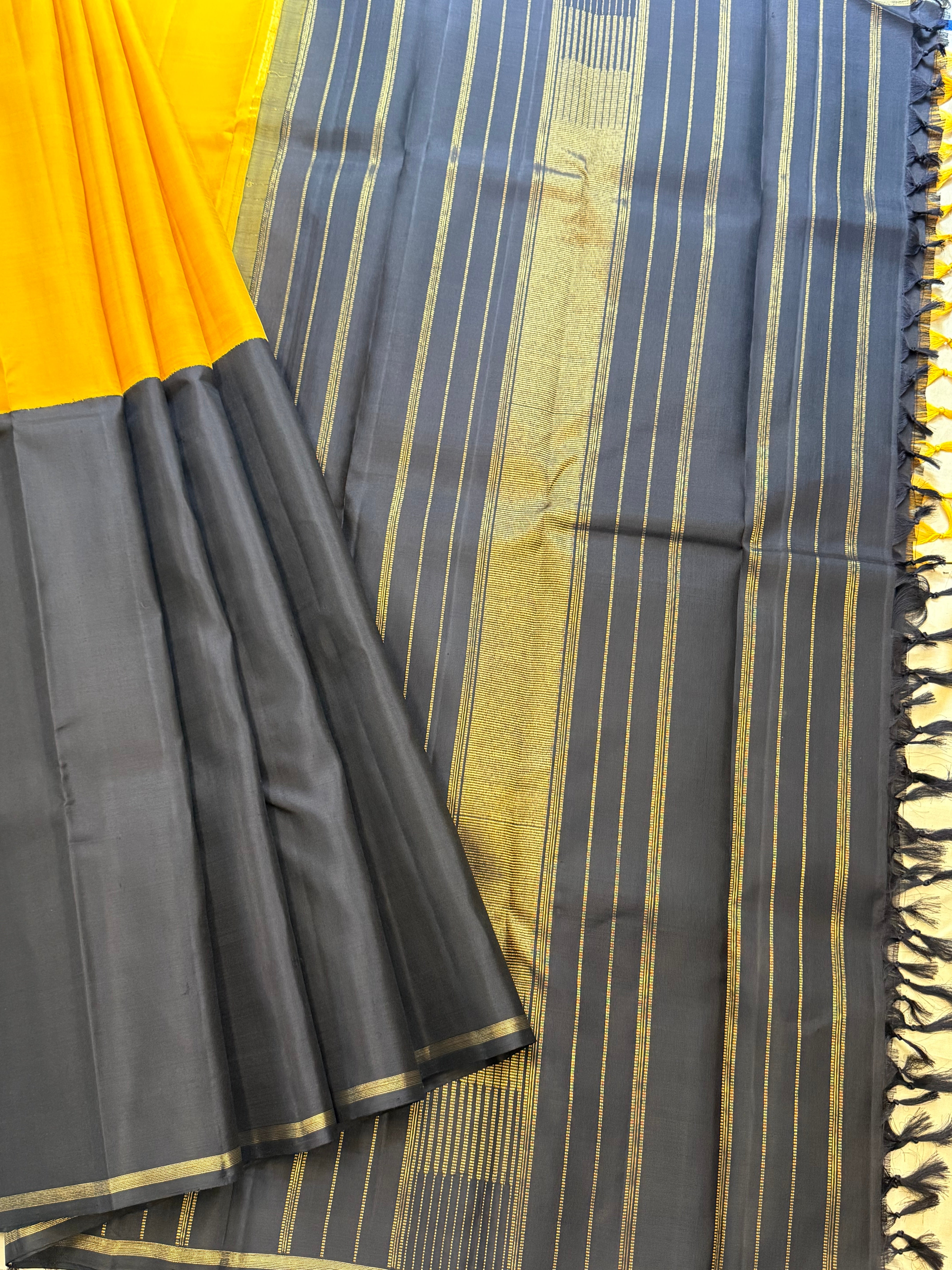 Yellow and black half an half / kanjipuram silk