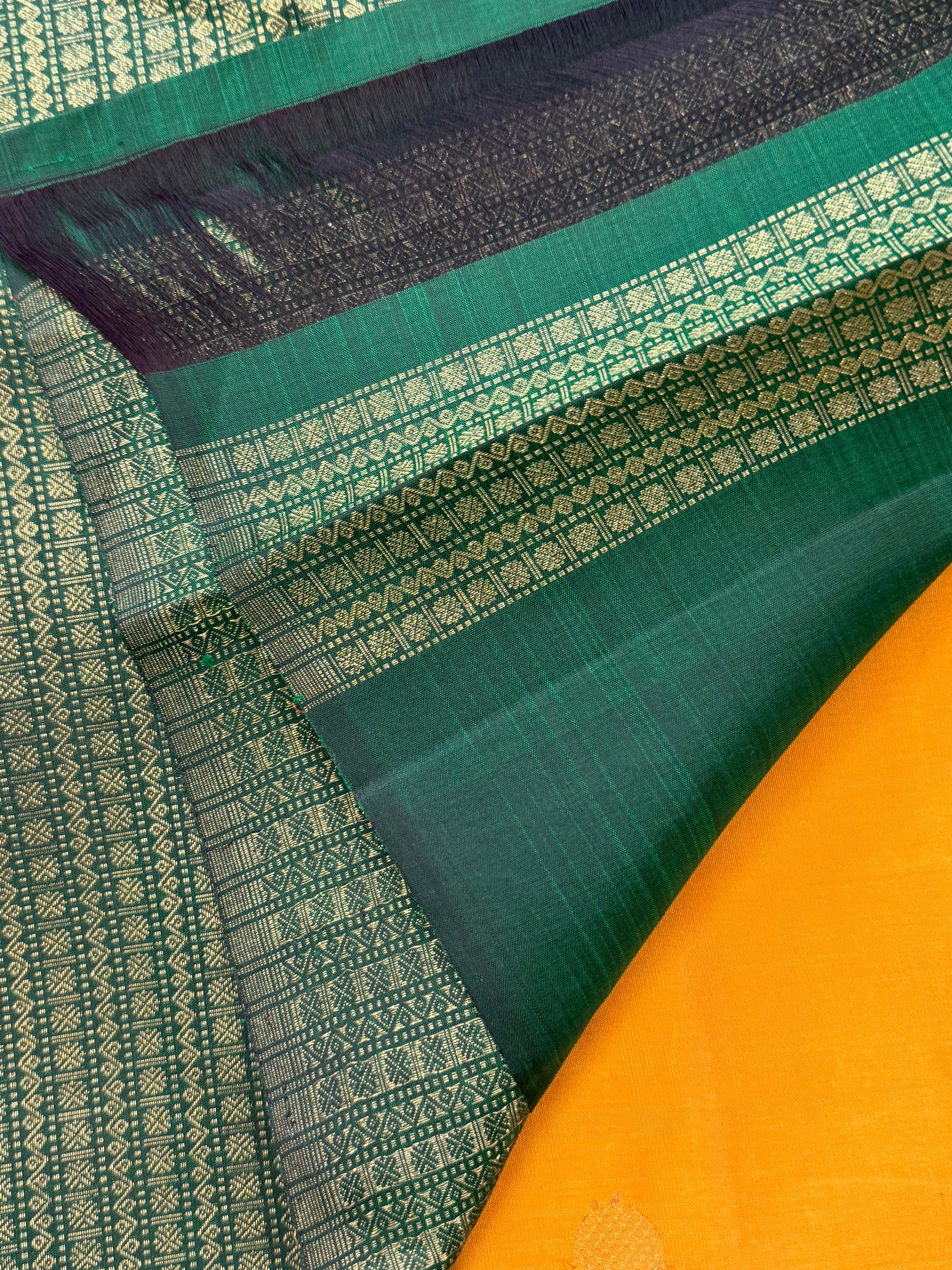 Golden yellow and green partly pallu / Kanjipuram silk