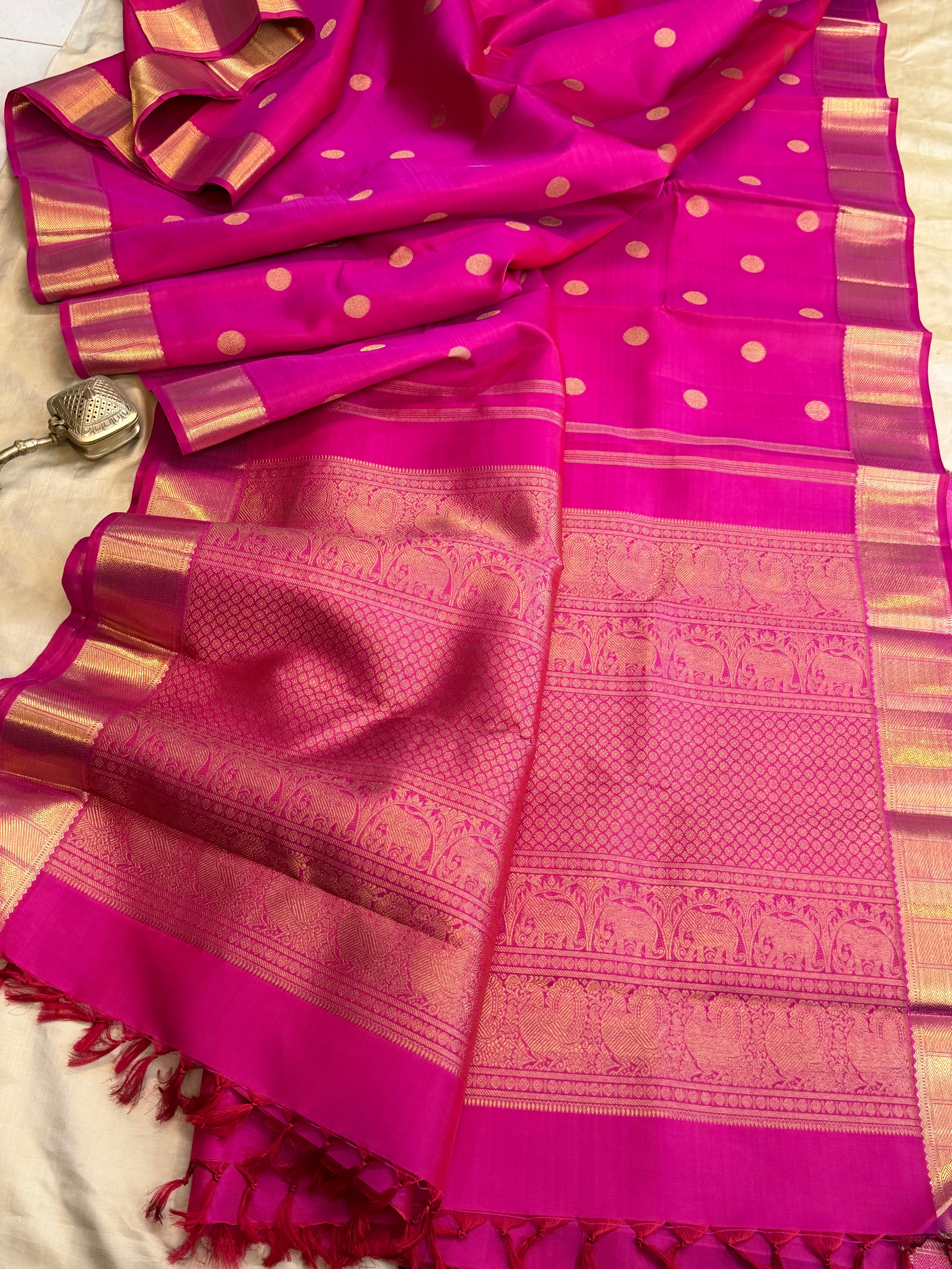 Moha : Rani pink round Butta  pure Zari Kanjipuram silk