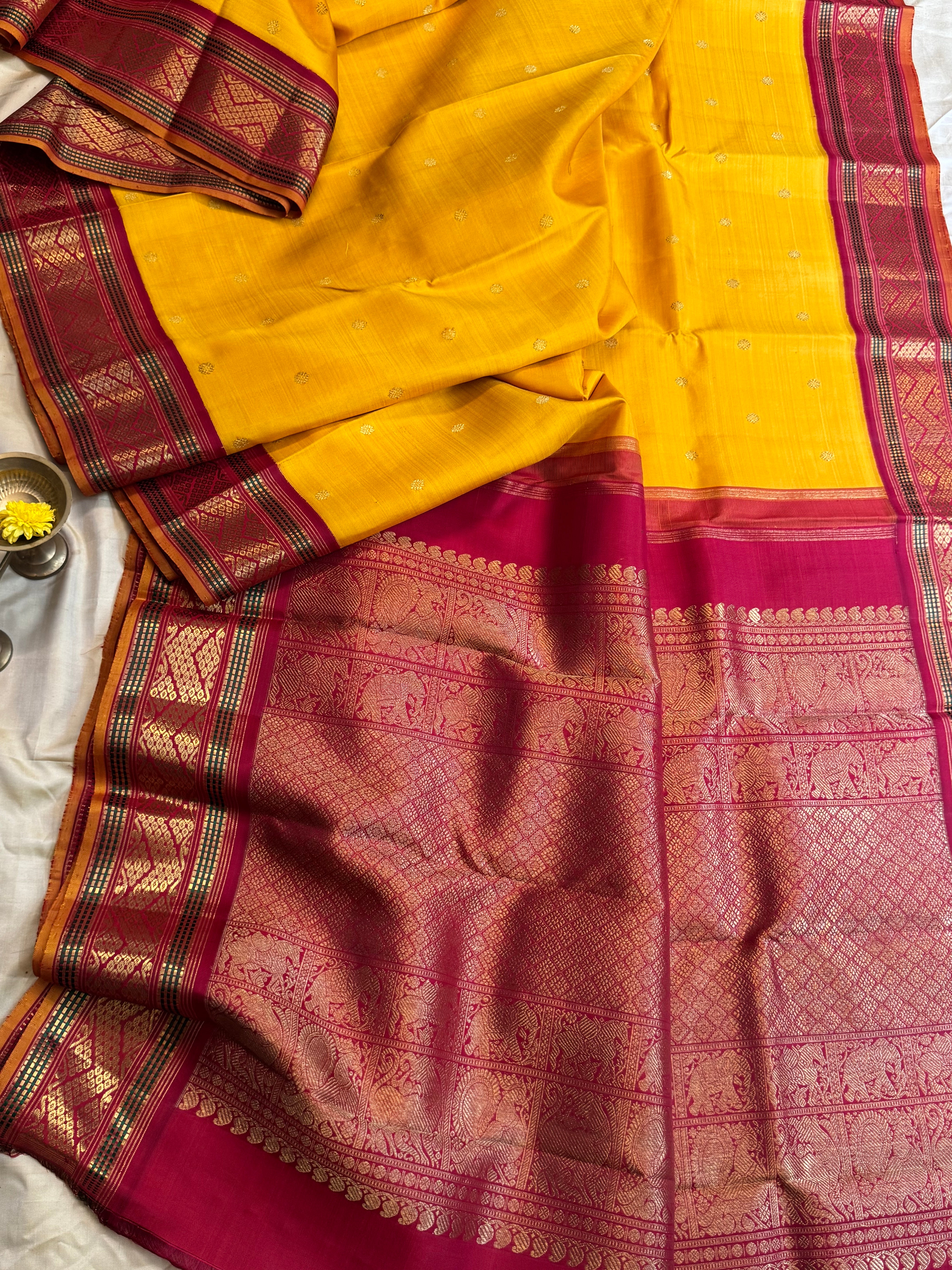 Mustard yellow vintage style adai pet kanjipuram silk.