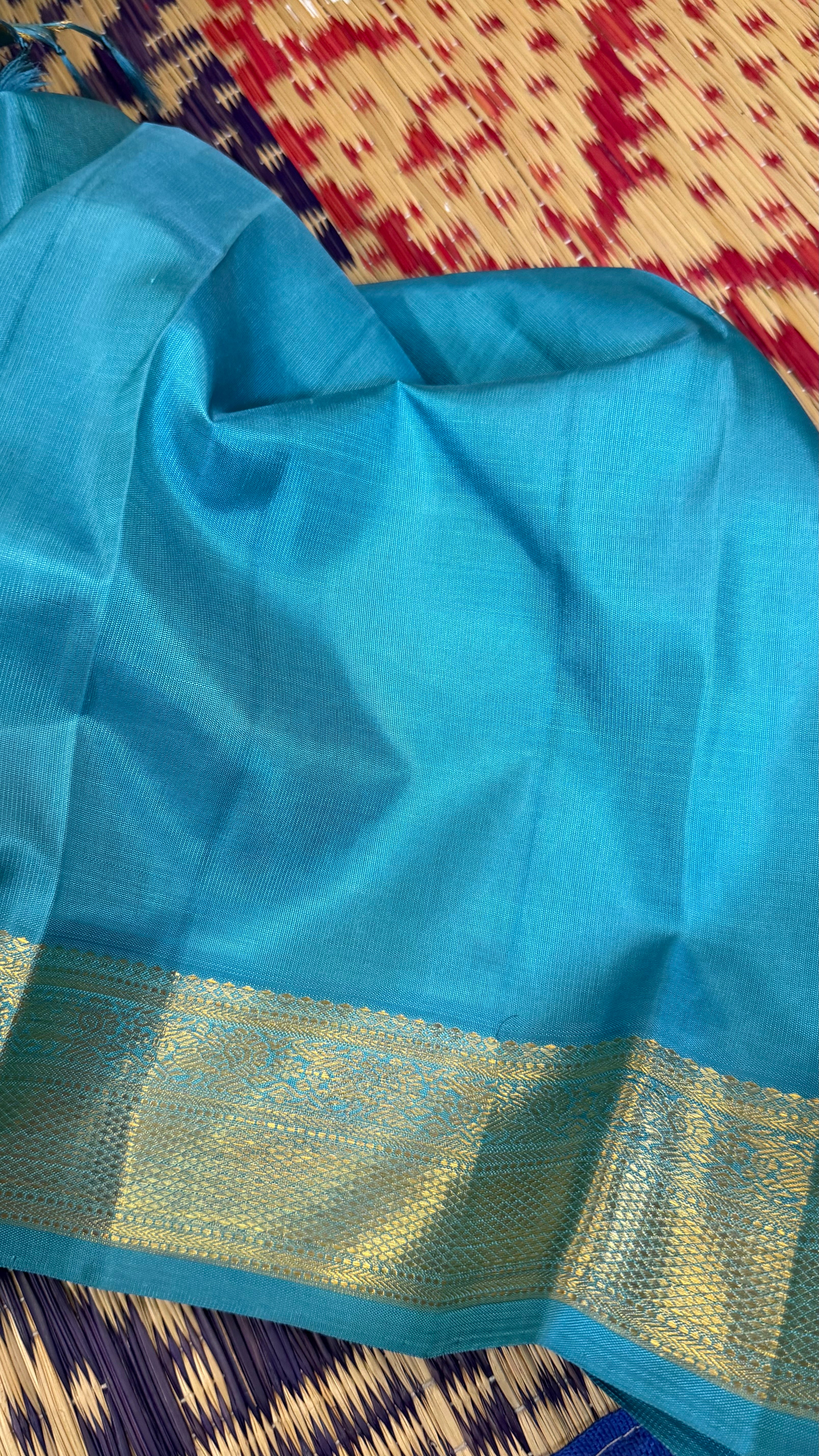 Swapnam : powder blue pet/ Kanjipuram silk