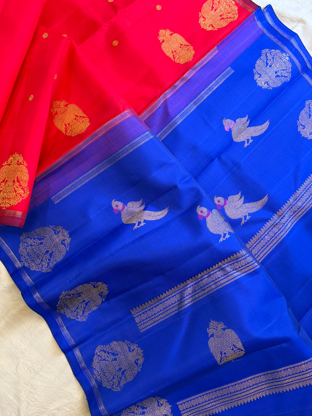 Chilli red border irutalaipakshi - pure Zari Kanjipuram silk