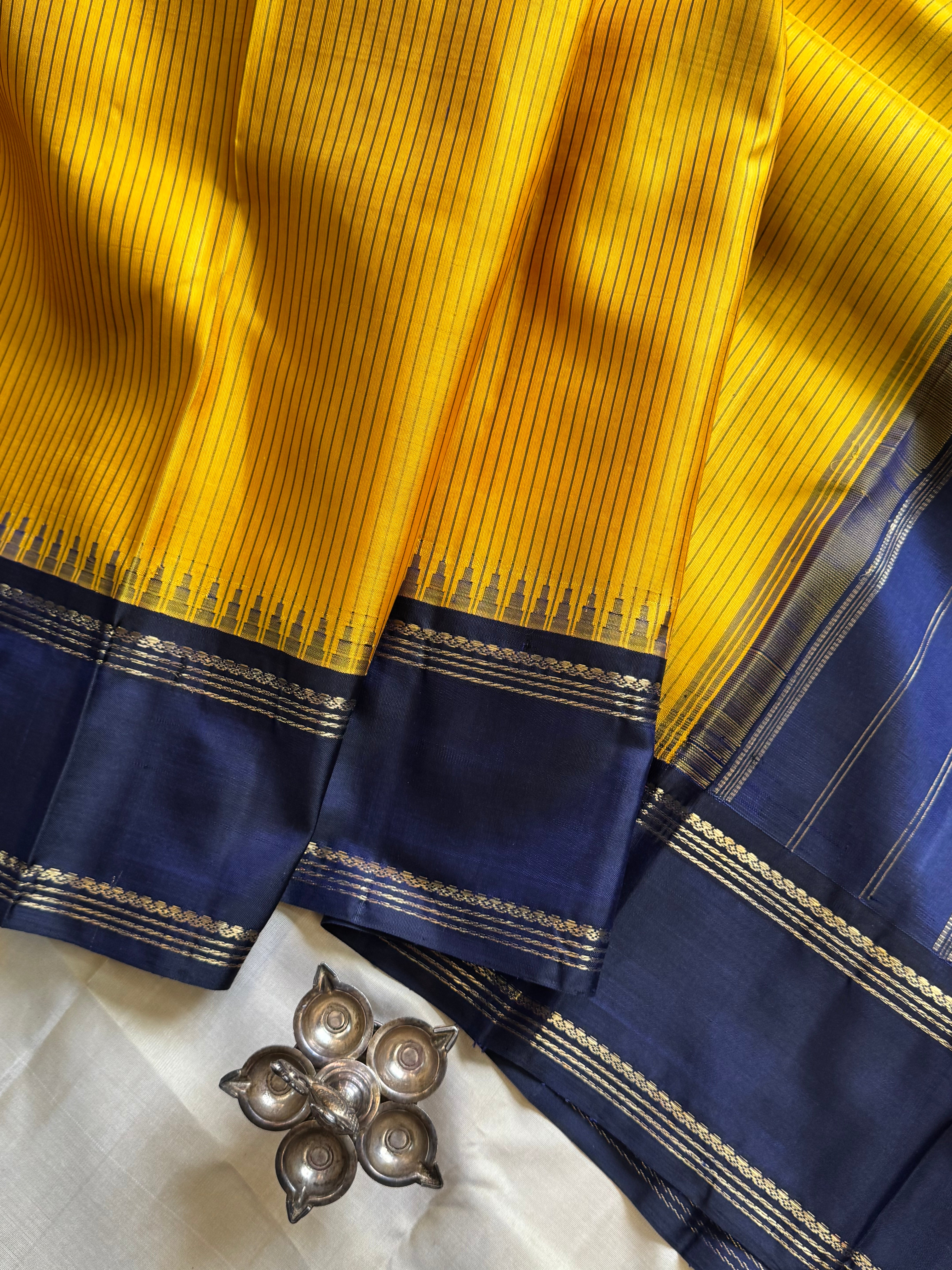 Mustard yellow and dark blue kai korvai / kanjipuram silk