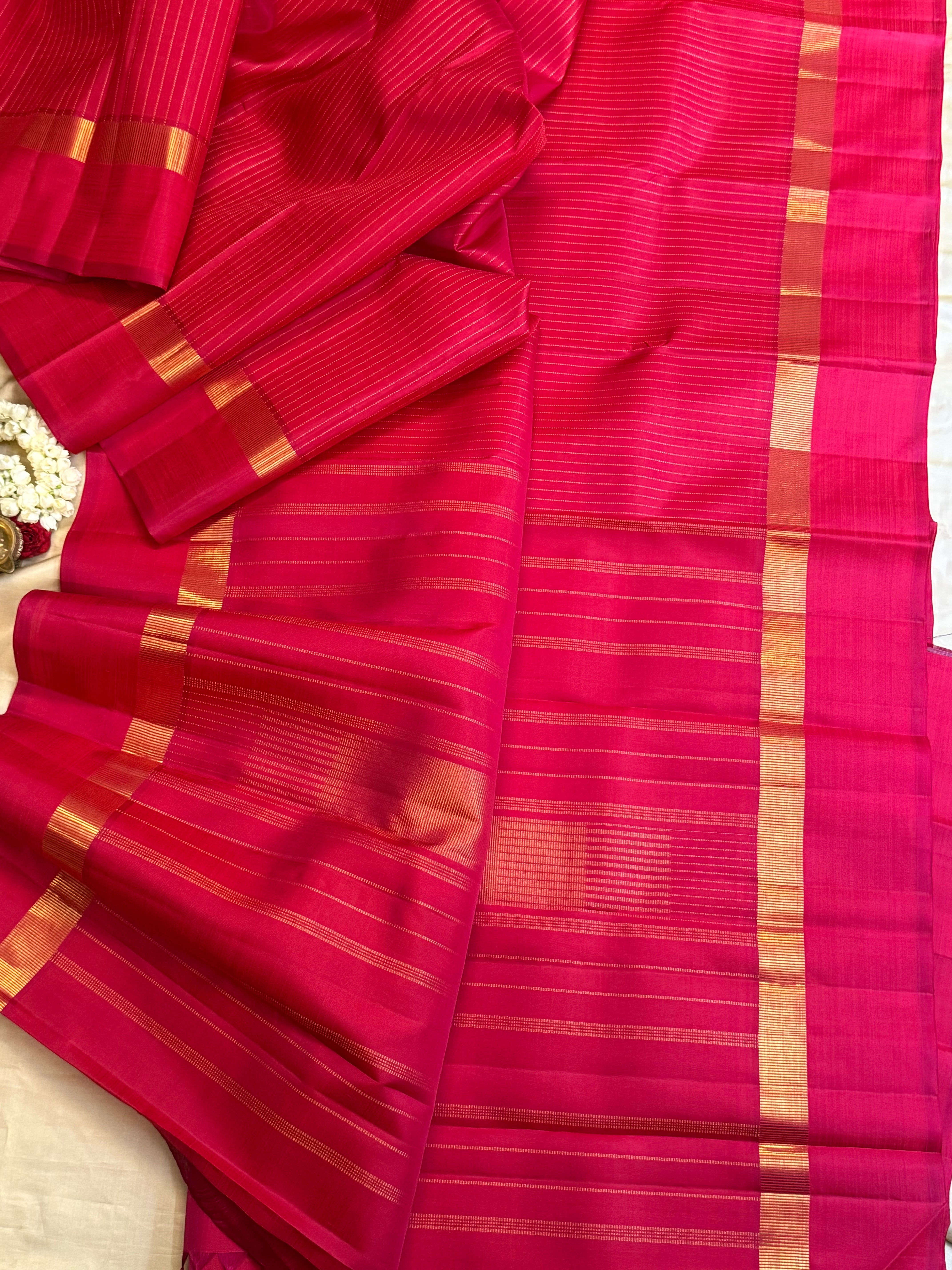 Pinkish red oosi zari lines kaal erangina border/ Kanjipuram silk