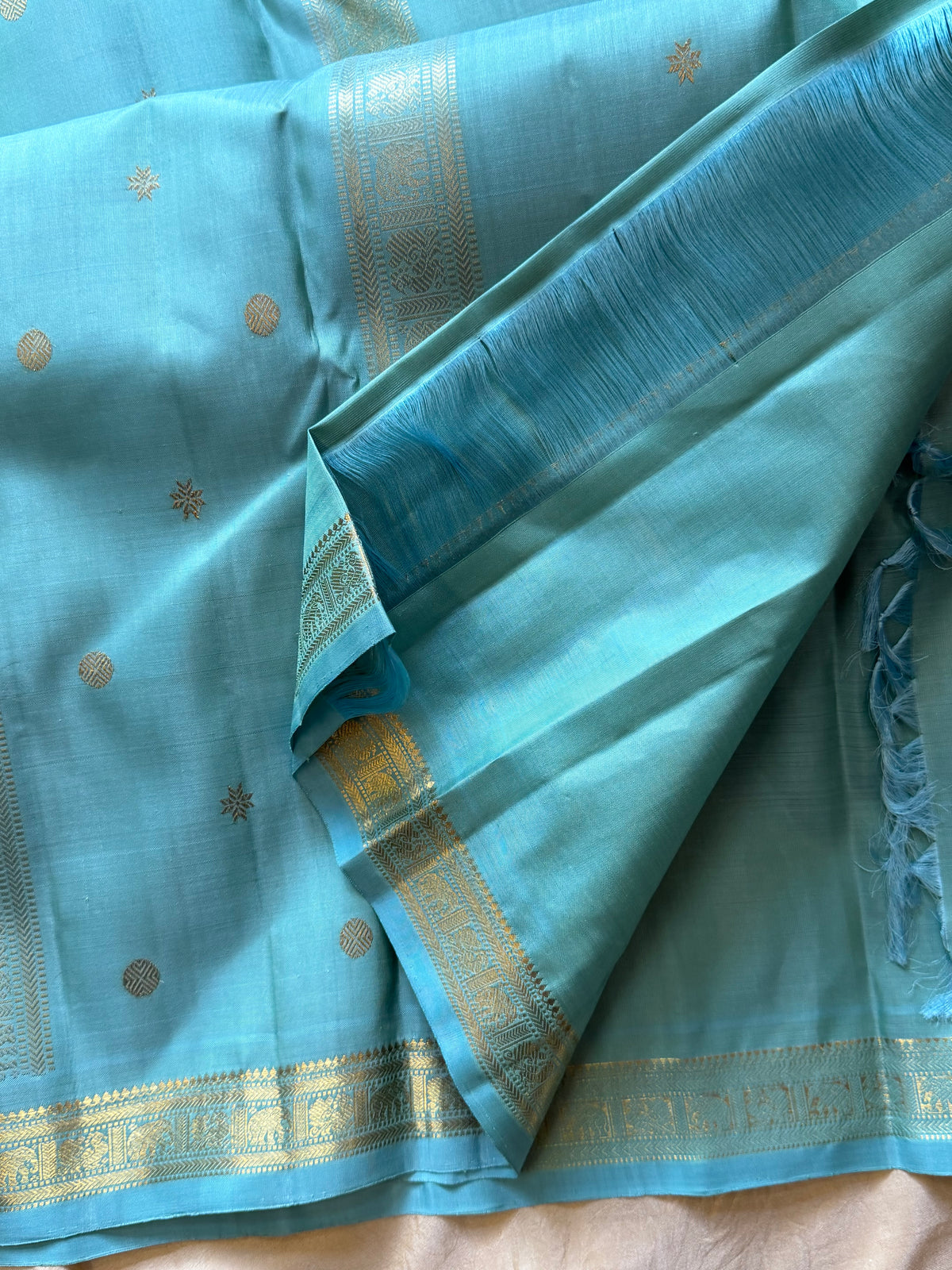 Pastel powder blue  color pure Zari pencil border Kanjipuram