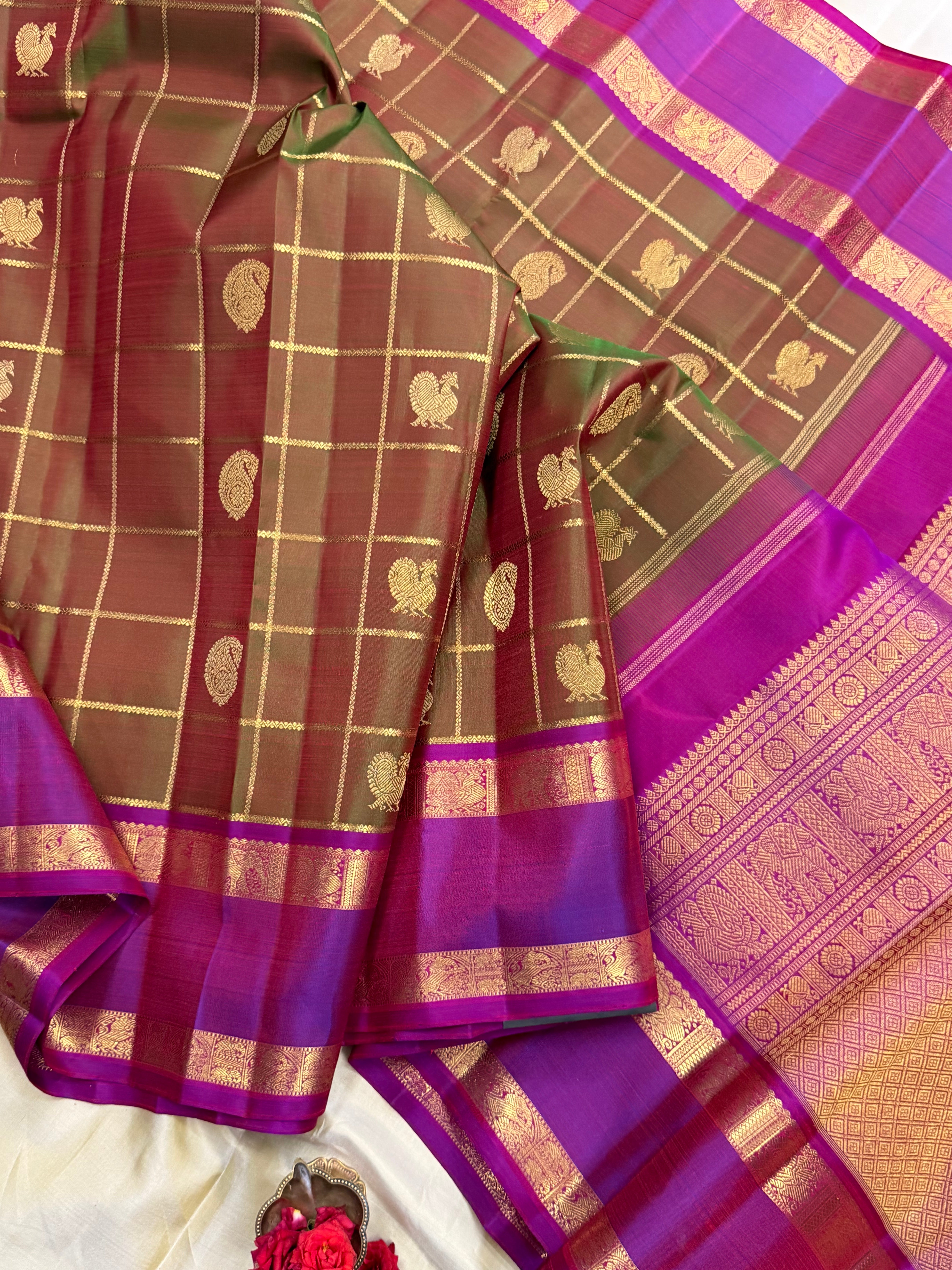 Mann : manthulir  Kattam earthy hues in pure Zari Kanjipuram silk
