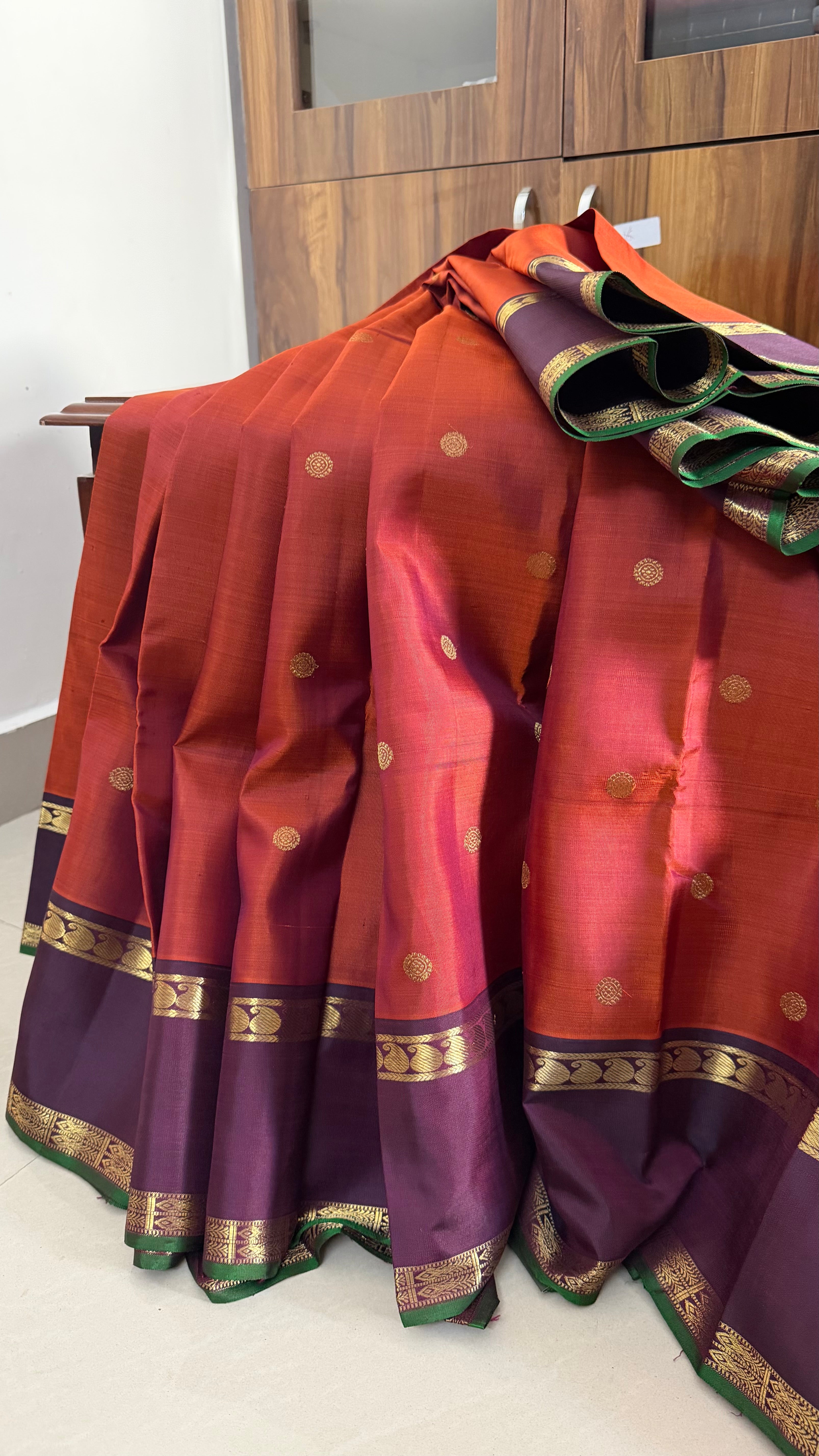 Rust with Paaku border /kanjipuram silk