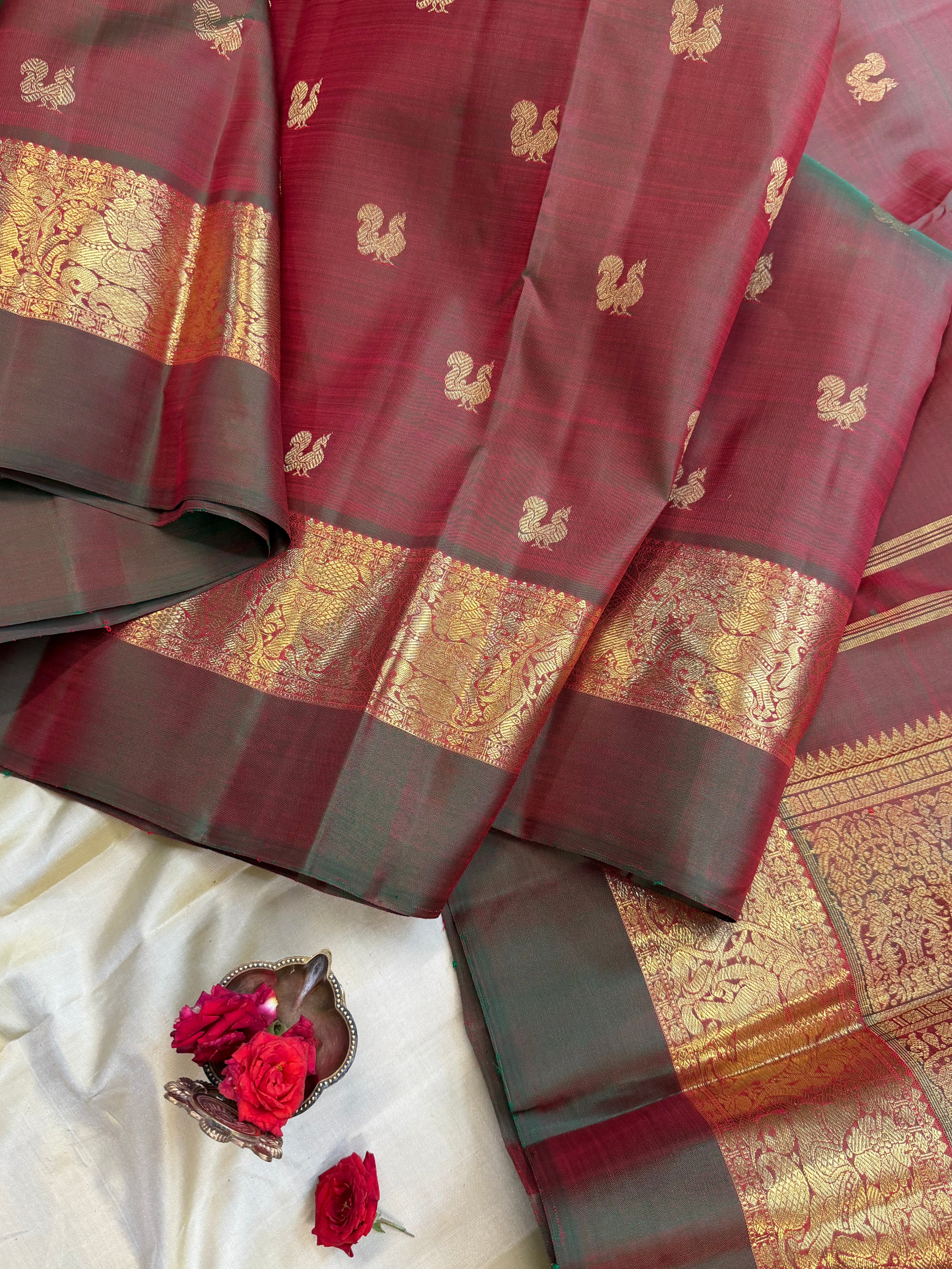 Mann : kaal erangina border earthy hues in pure Zari Kanjipuram silk