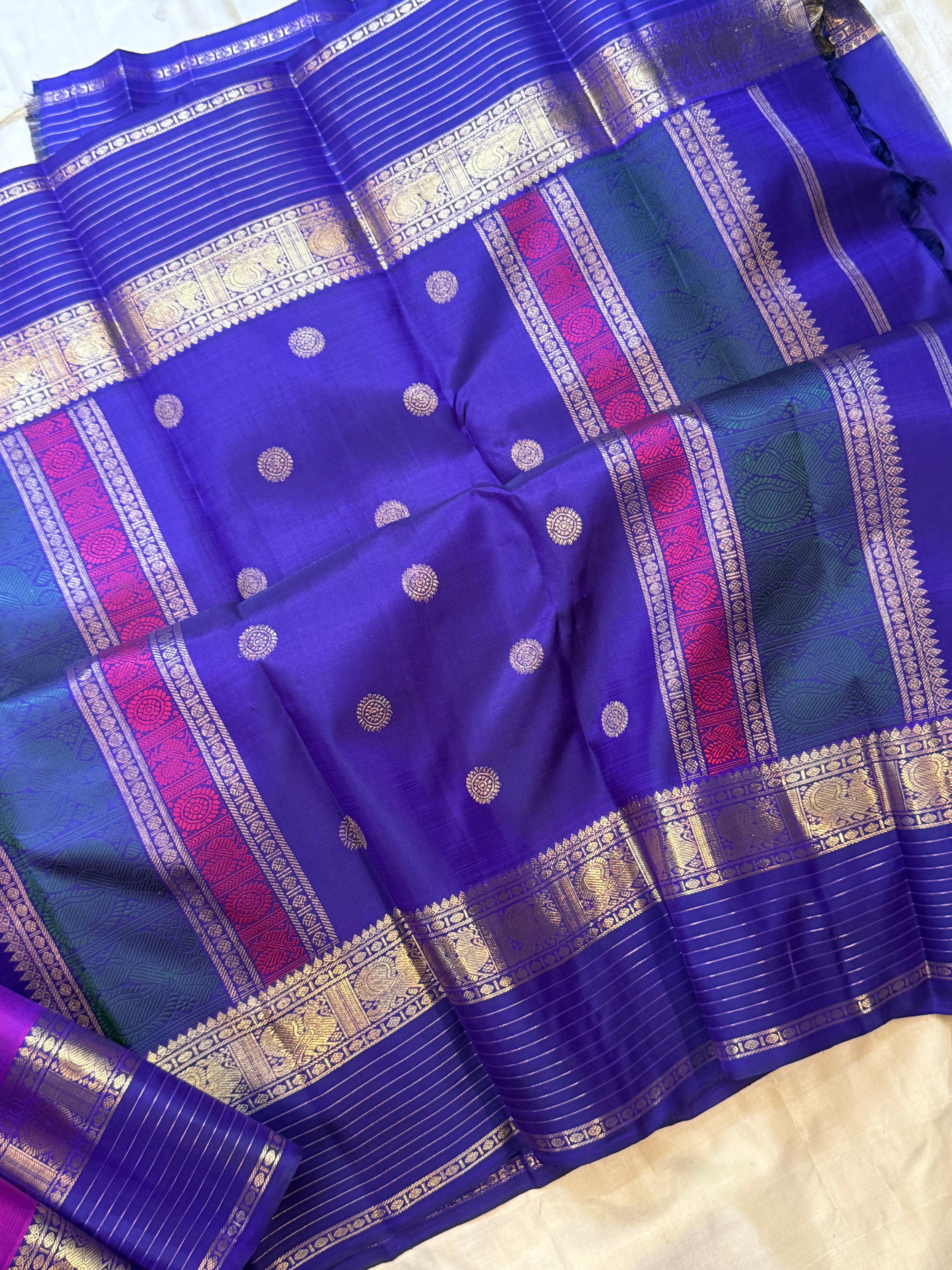 Vadamalli and purple kaal erangina border/ Kanjipuram silk