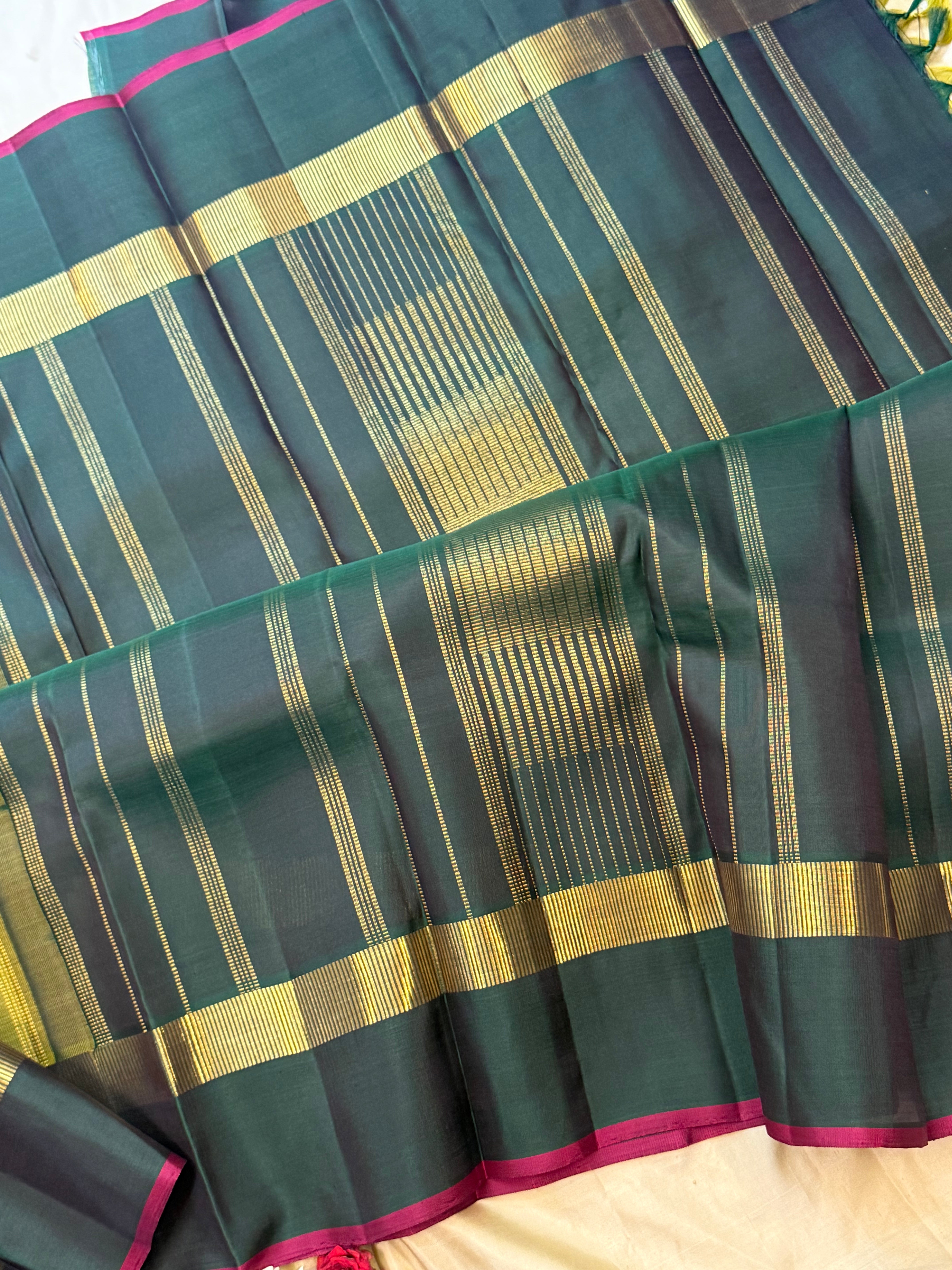 Olive green and dark green kaal erangina border/ Kanjipuram silk