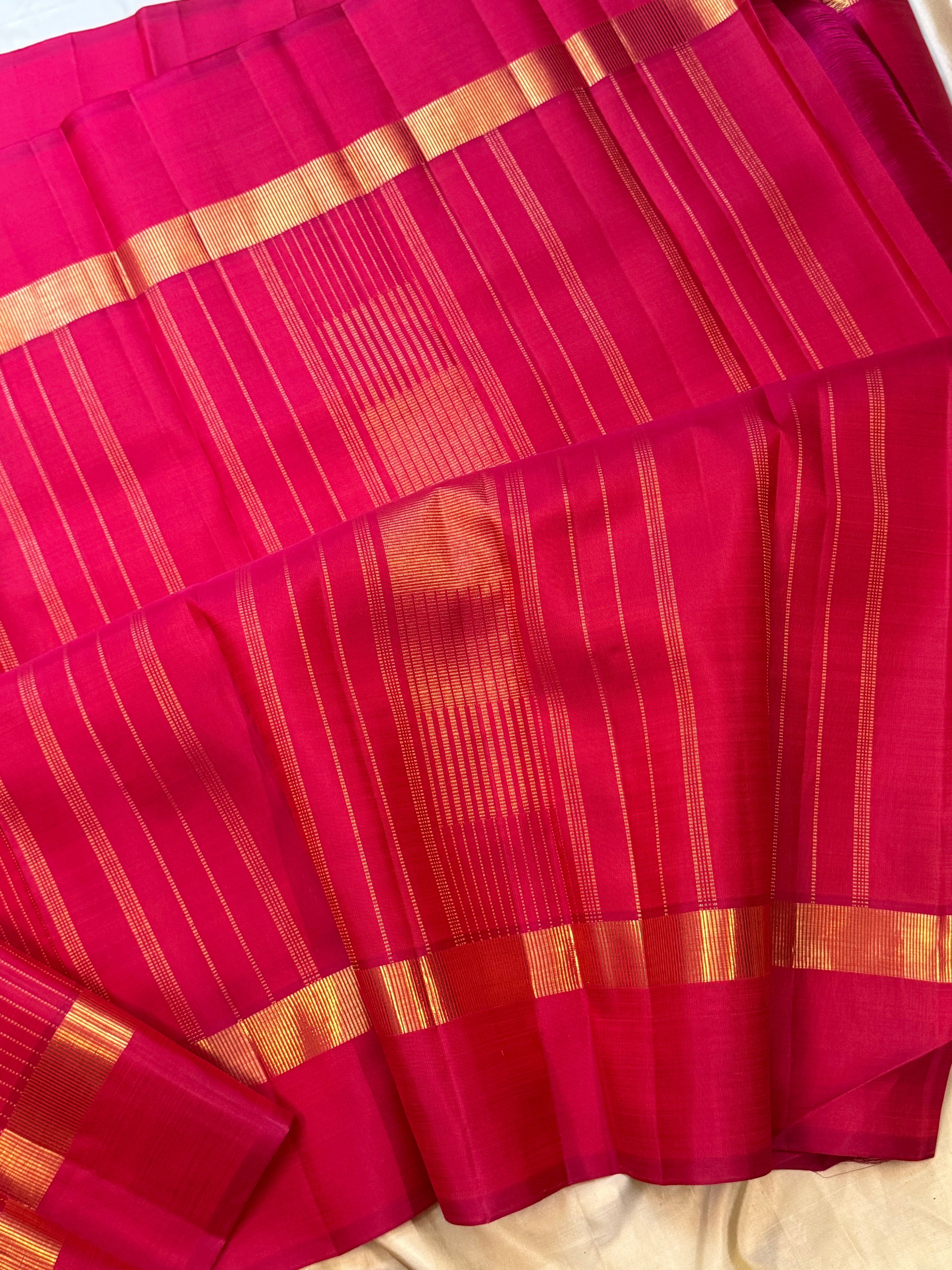 Pinkish red oosi zari lines kaal erangina border/ Kanjipuram silk
