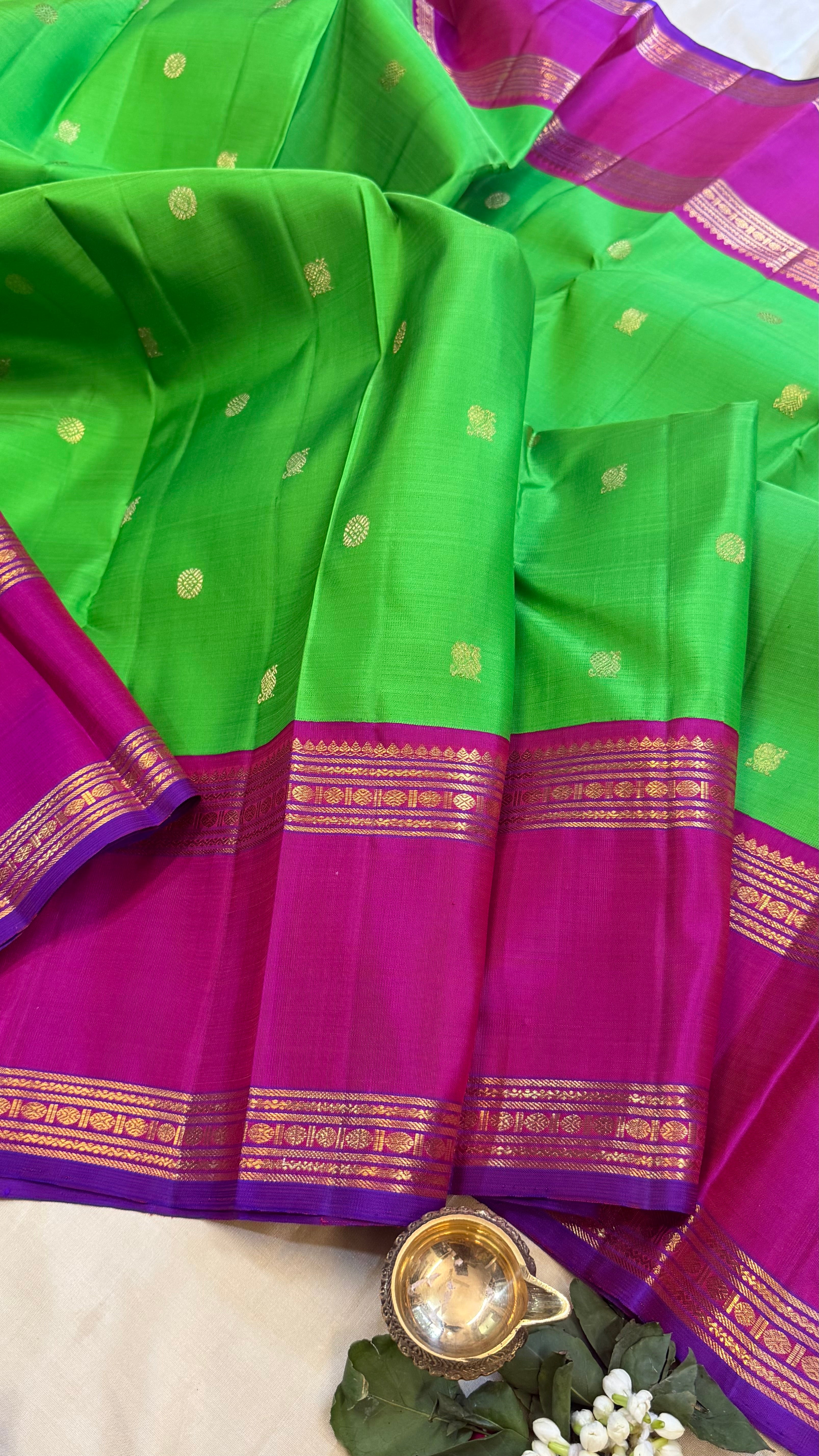Parrot green and pink rettapet border kai korvai/ kanjipuram silk