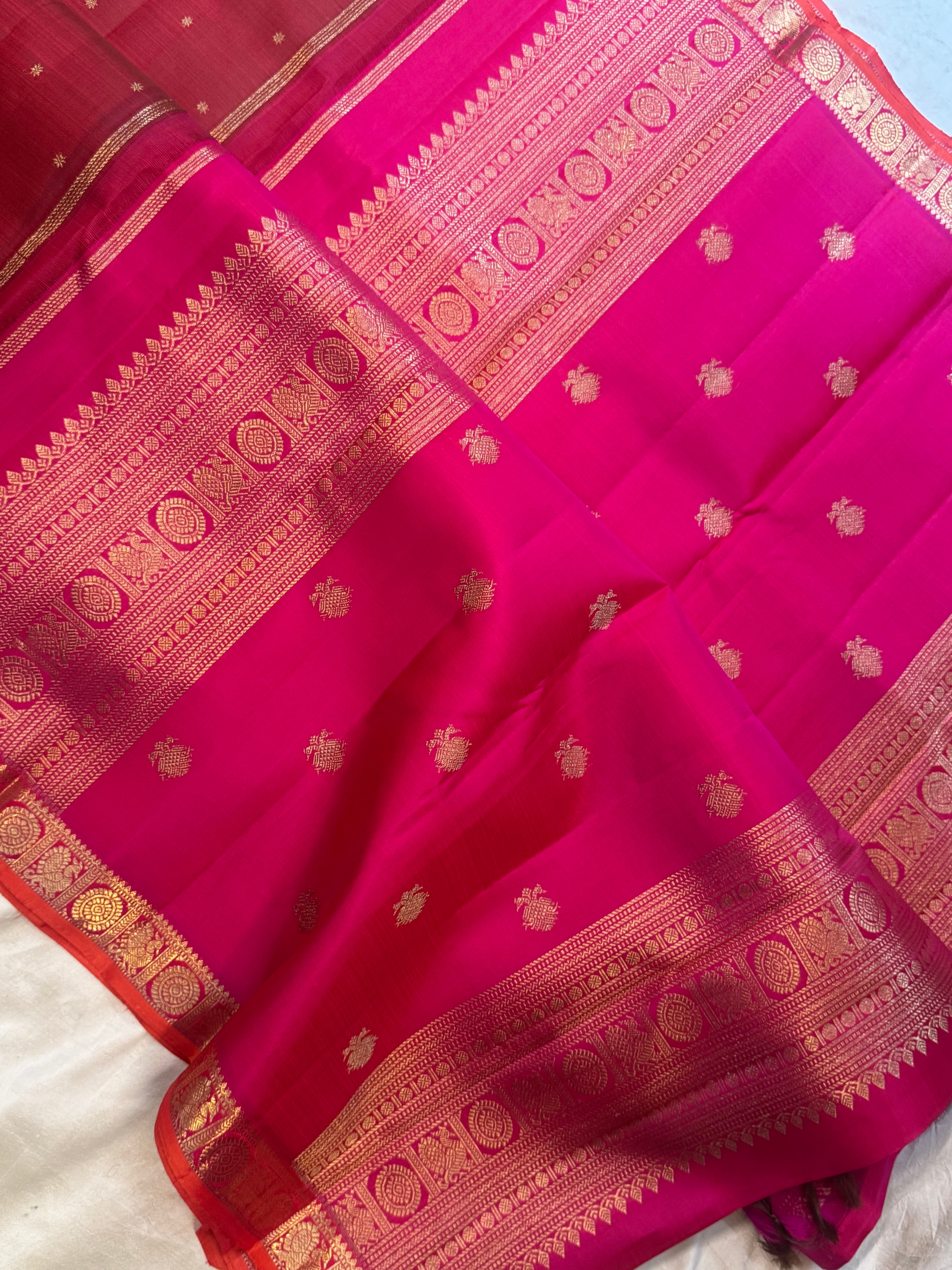 Manthulir pink border small border kanjipuram silk