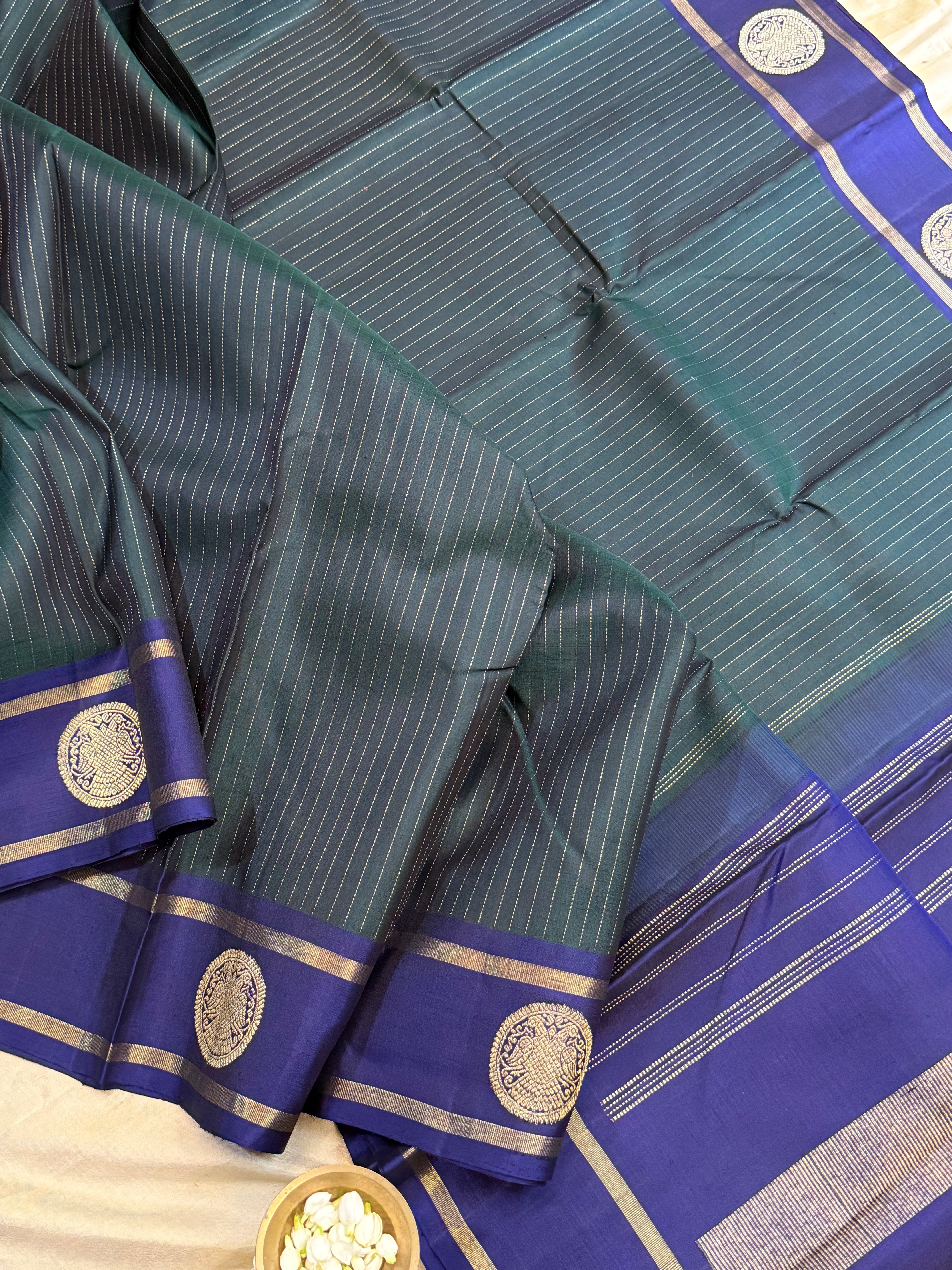 Dark green and violet oosi stripes border butta / Kanjipuram silk