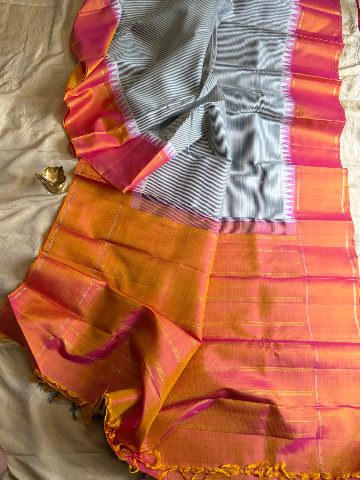 Striped Korvai peach  border Arani silk saree