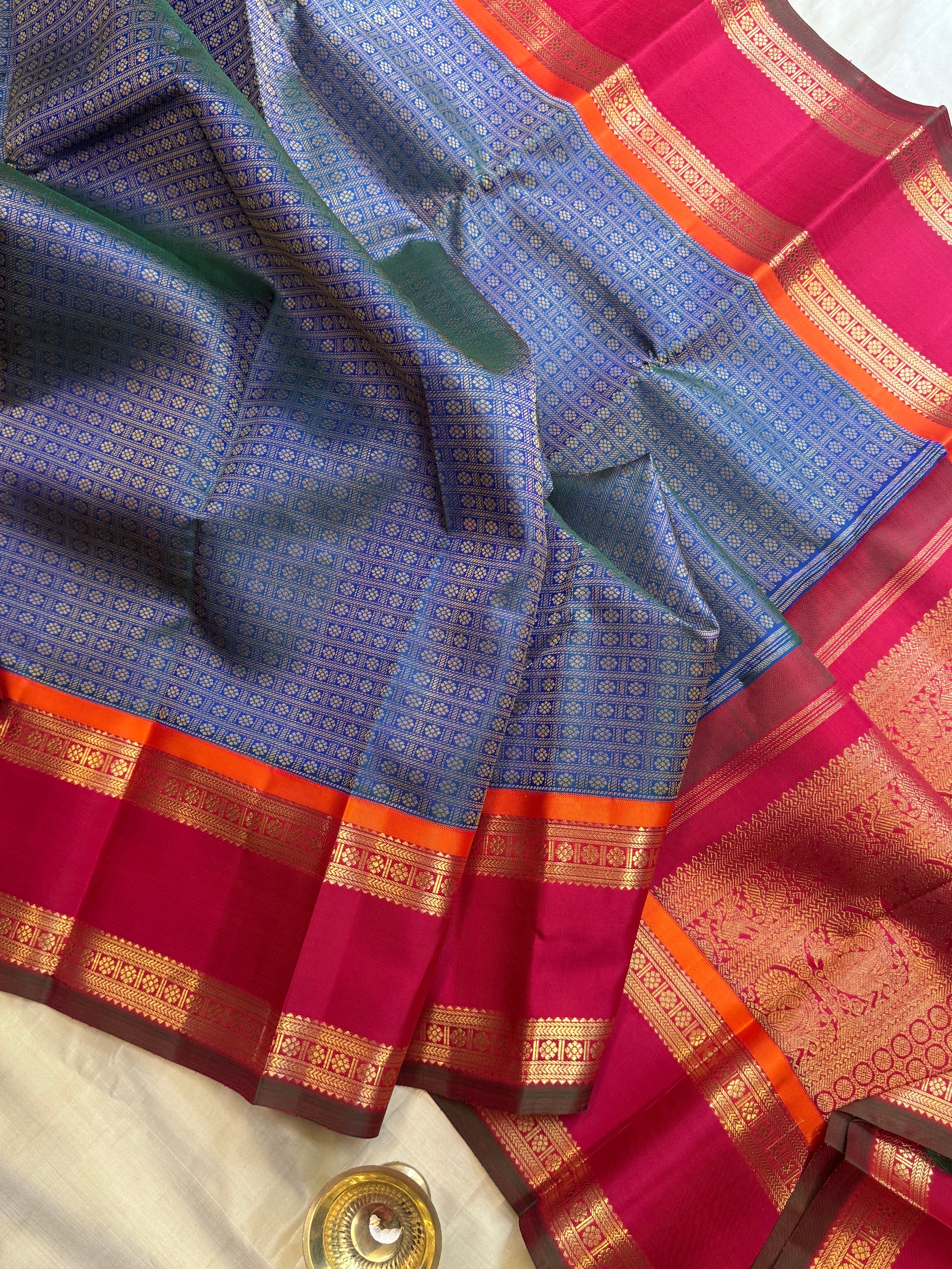Mayilkazhuthu Laksham Butta korvai : kanjipuram silk