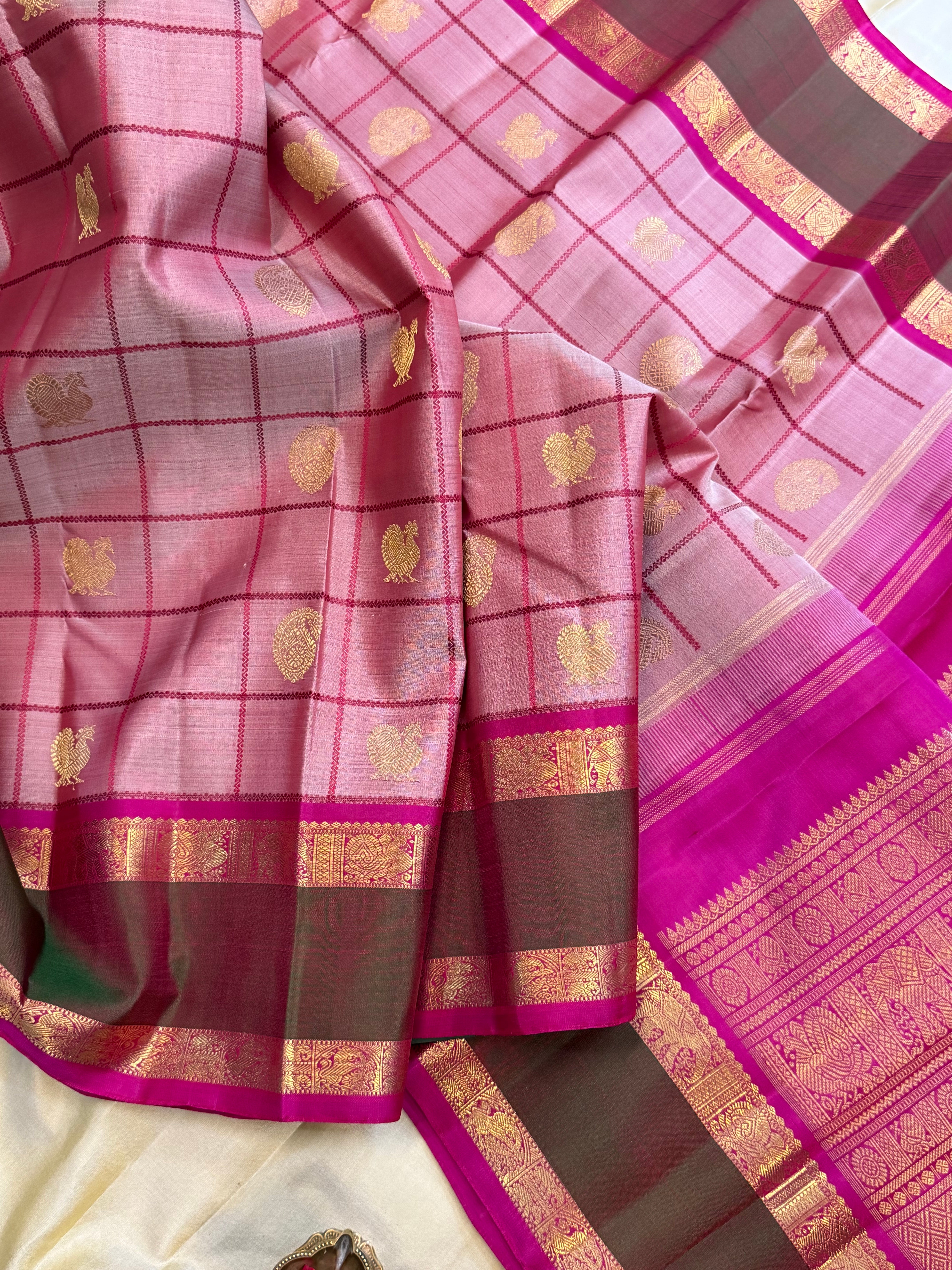Mann : bud rose Kattam earthy hues in pure Zari Kanjipuram silk