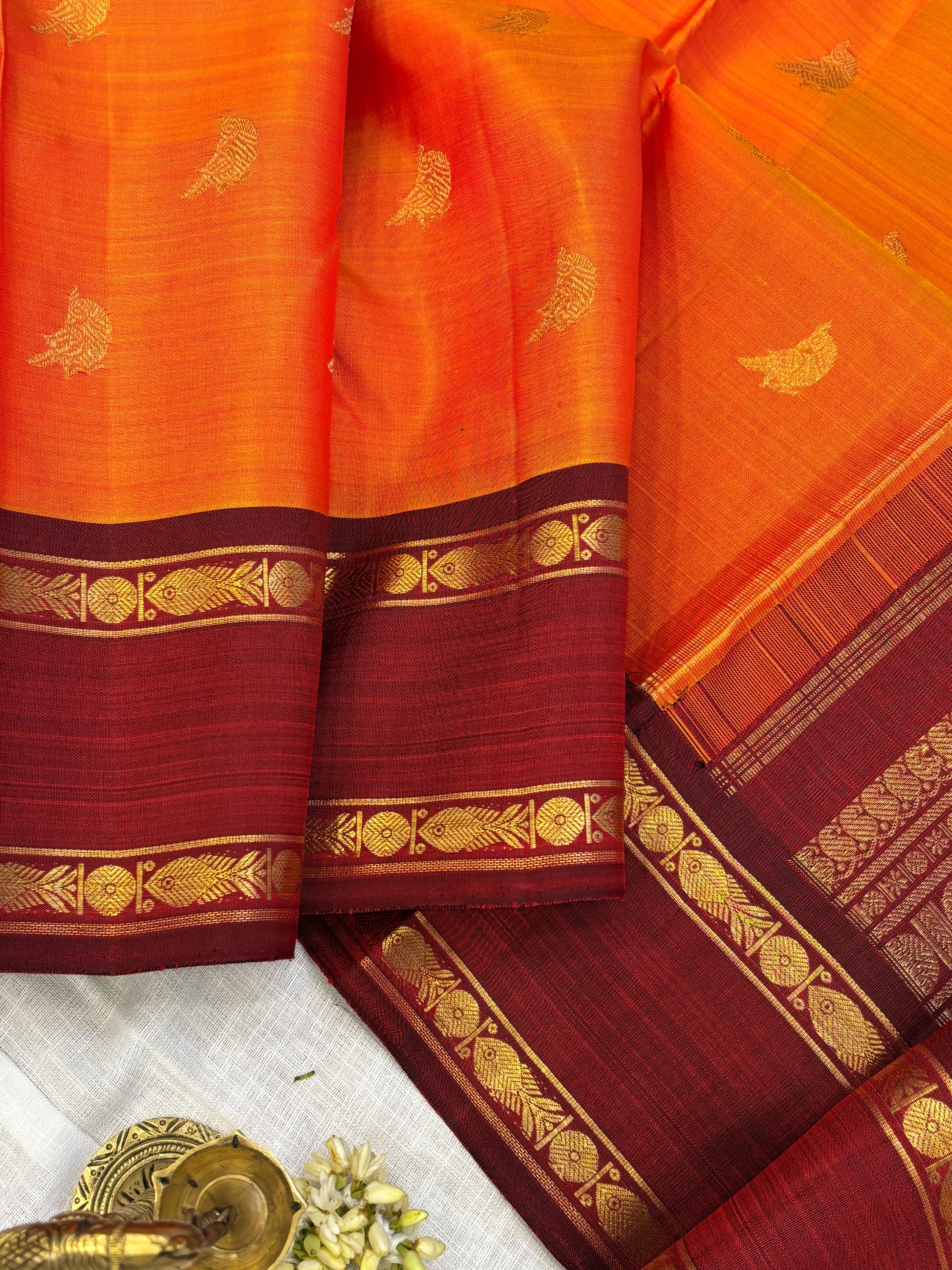 Rustic orange and araku rettapet / kanjipuram silk