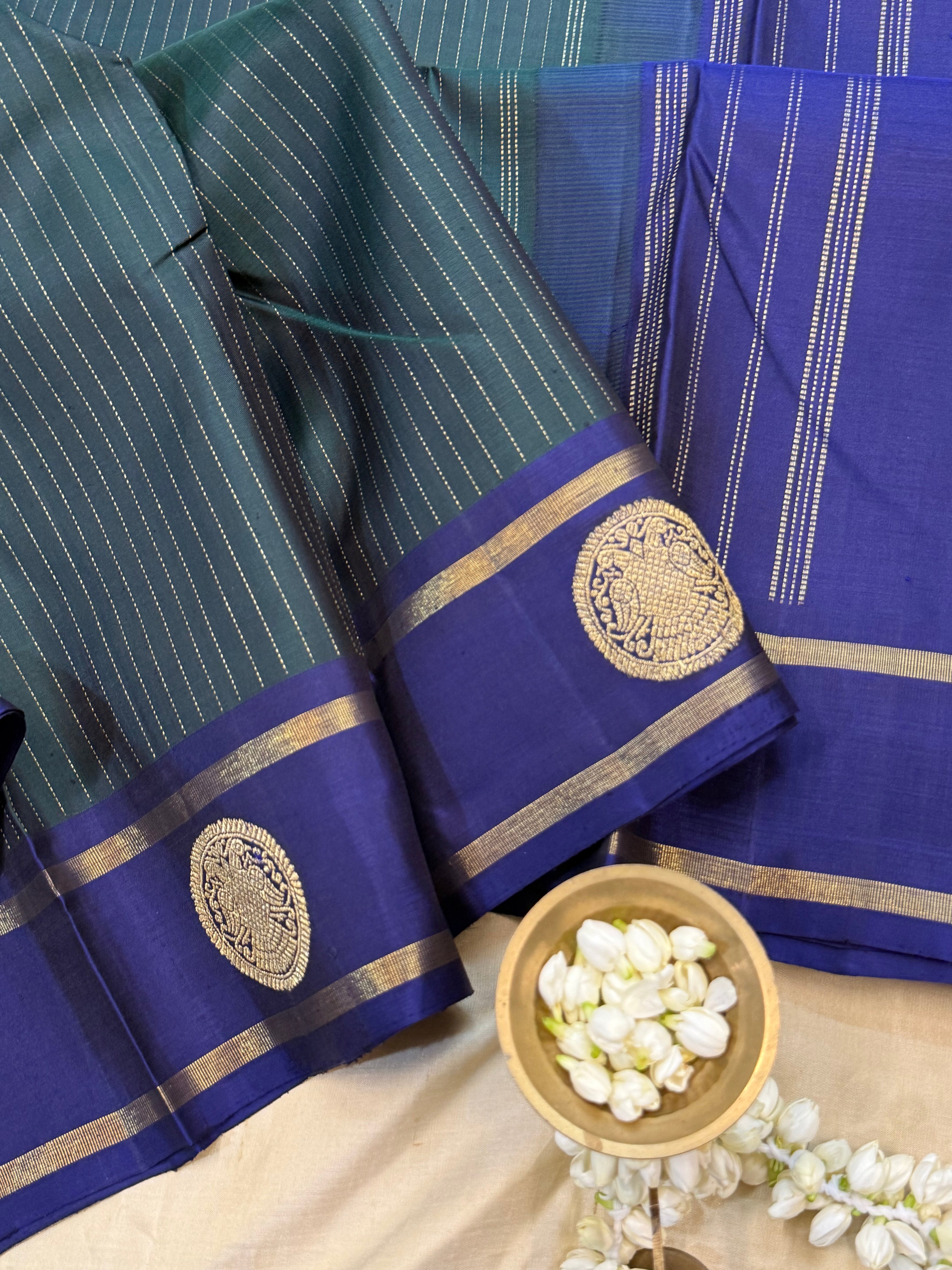 Dark green and violet oosi stripes border butta / Kanjipuram silk