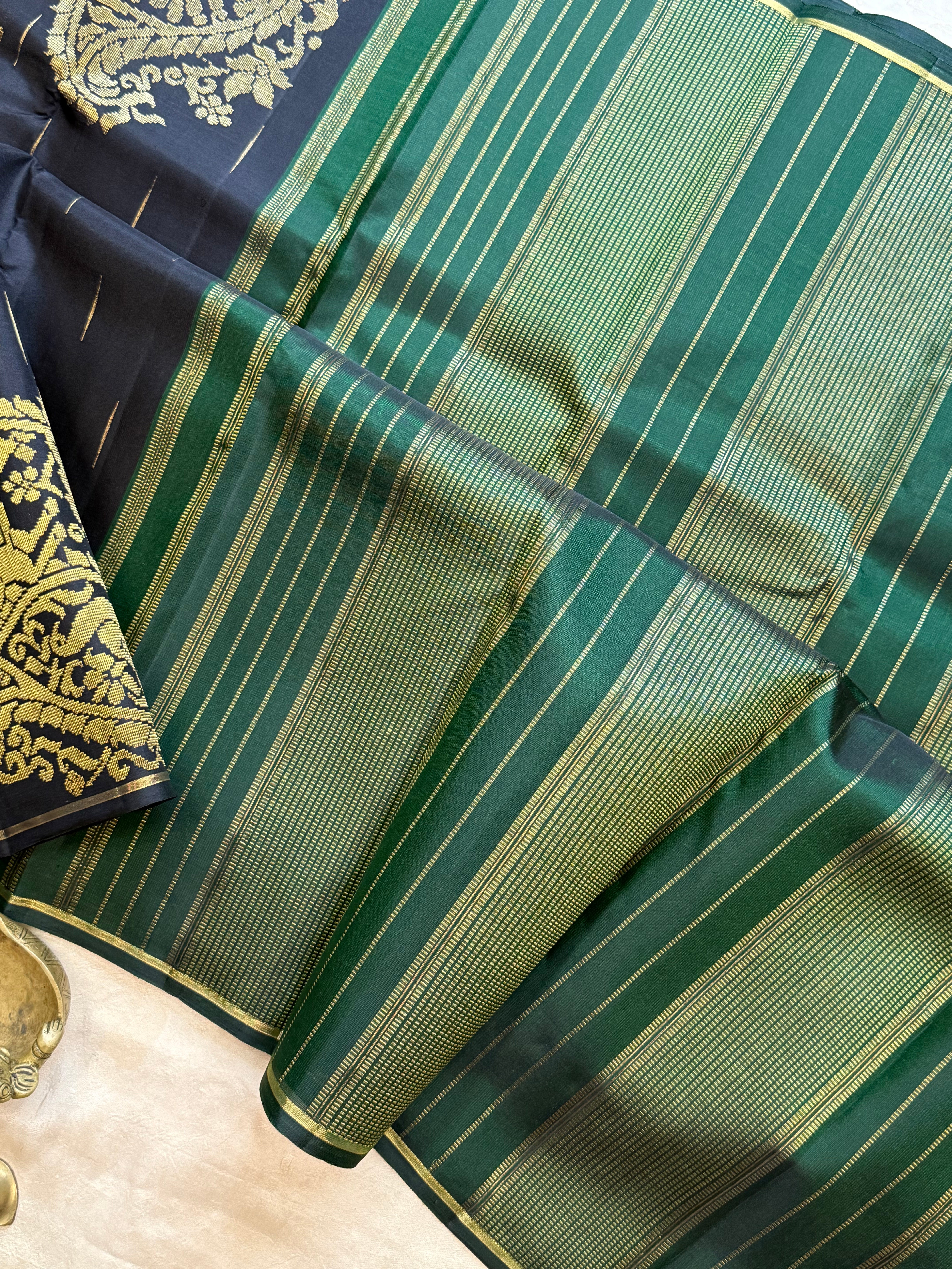 Kalai: Black Borderless Kanjivaram Silk Saree with Malli Moggu
