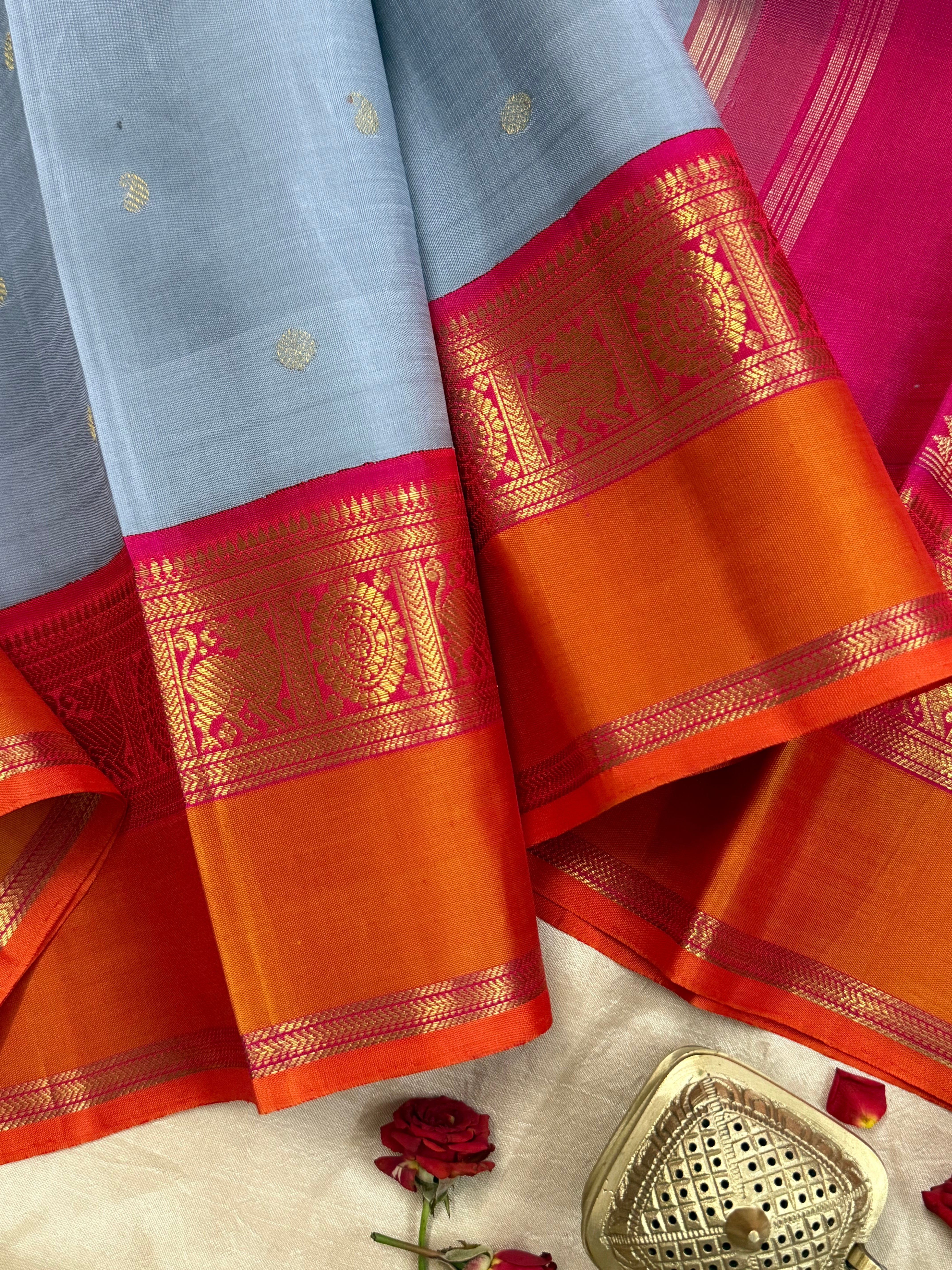 Silverish grey and orangish and pink kai korvai retta border / Kanjipuram silk