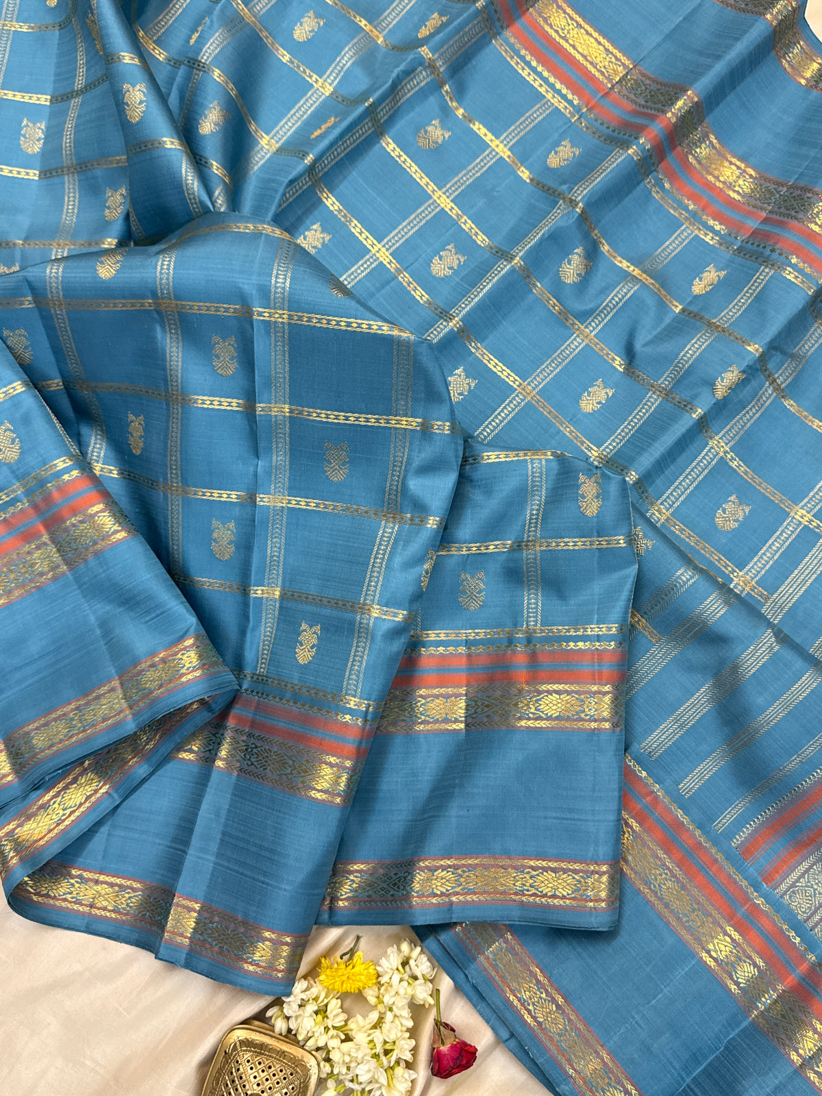 Master weaver- pastel powder blue kattam Iruthalaipakshi butta adai woven/ Kanjipuram silk