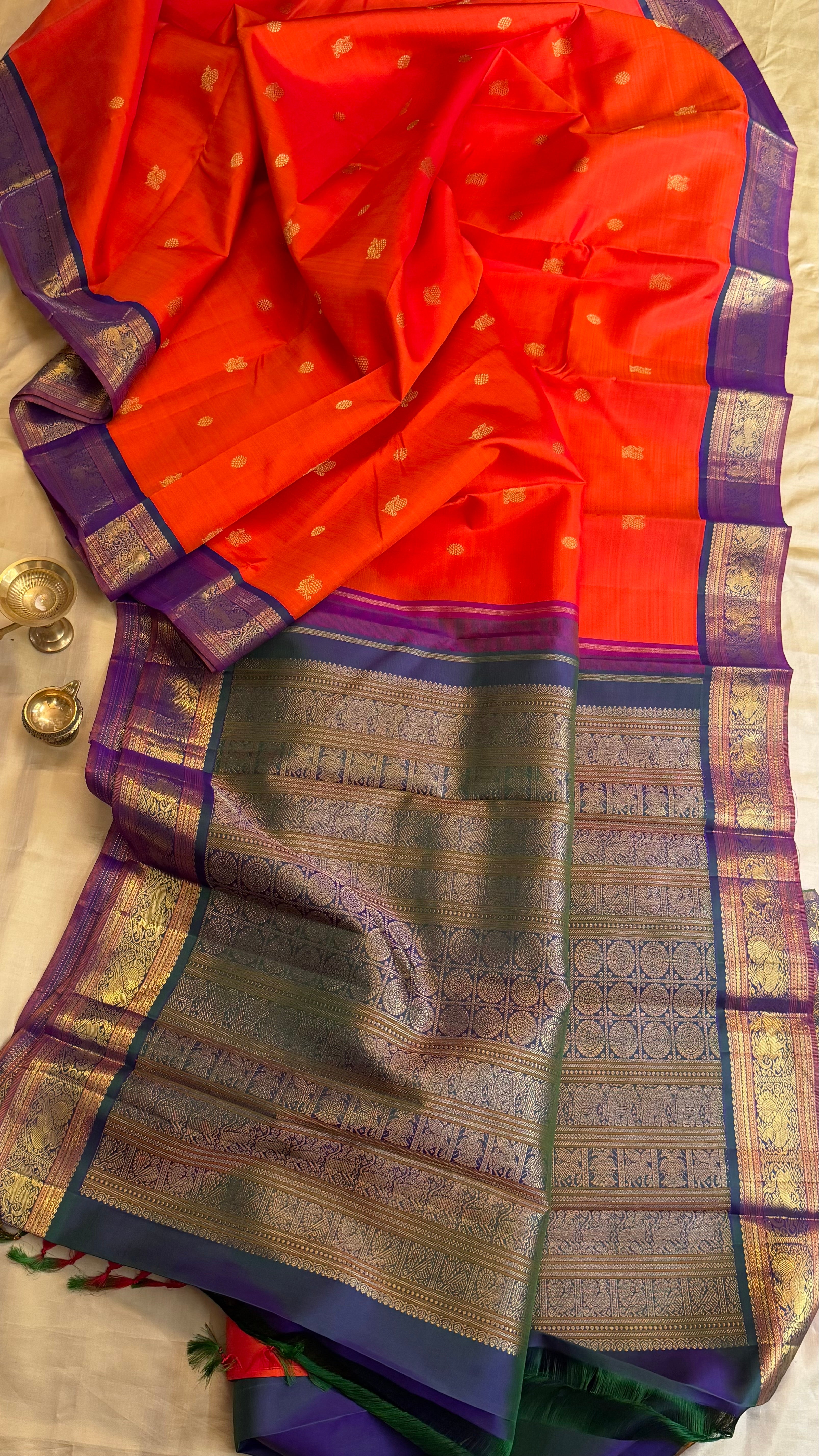 Orange and mayilkazhuthu Kai Korvai/Kanjipuram silk