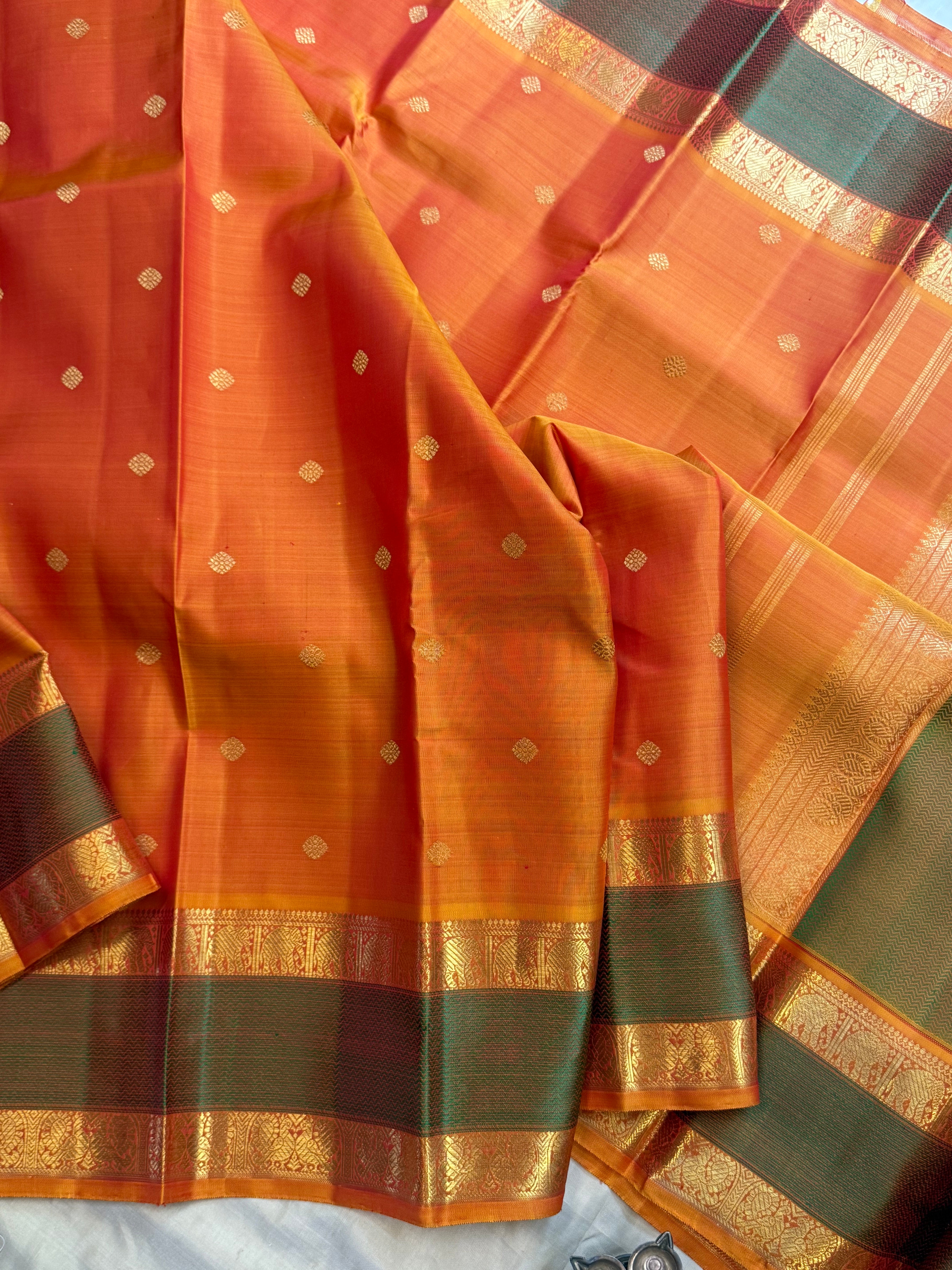 Orange rettapet border/ Kanjipuram silk