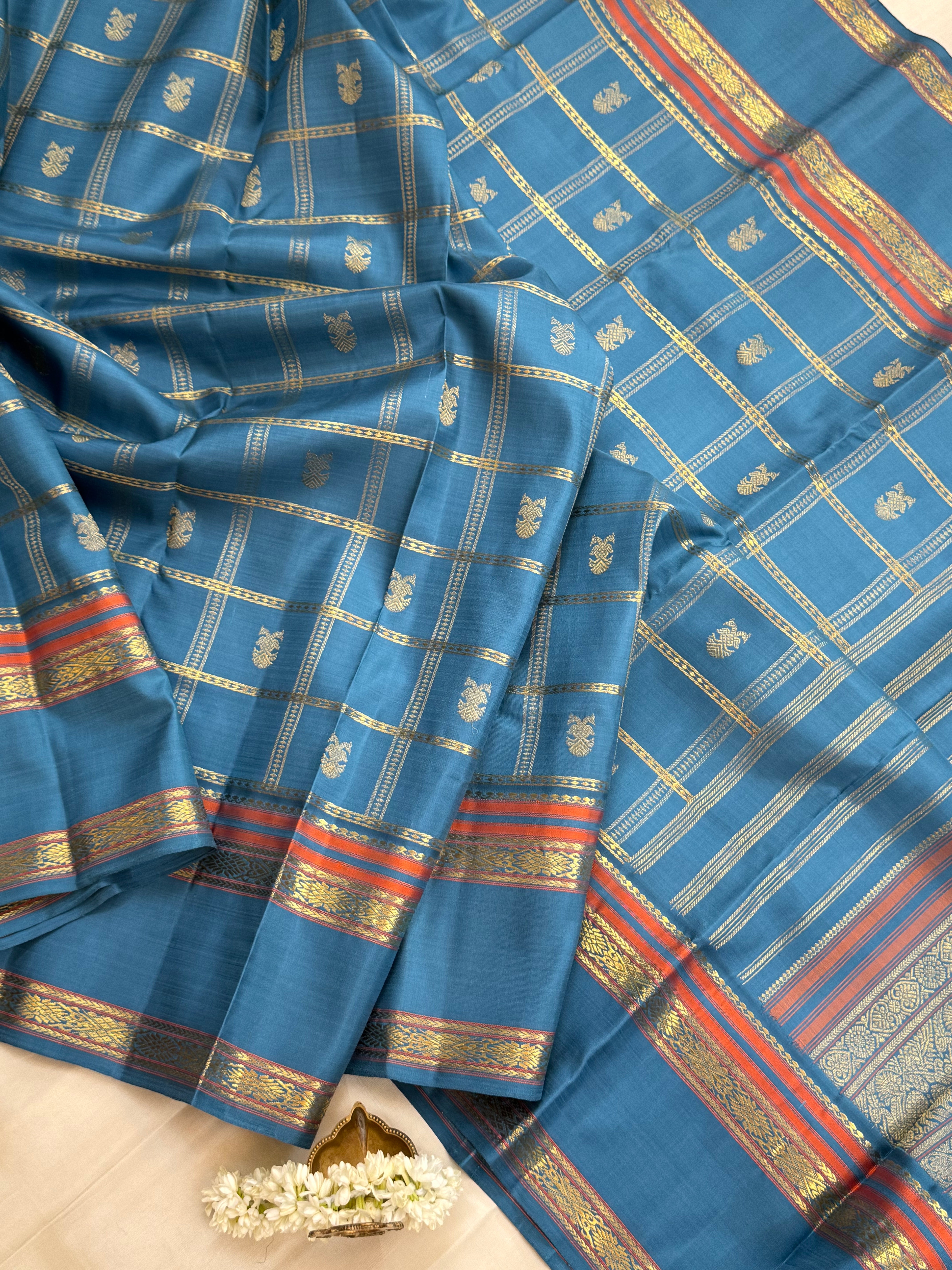 Master weaver Powder blue Kattam Butta Kanjipuram silk