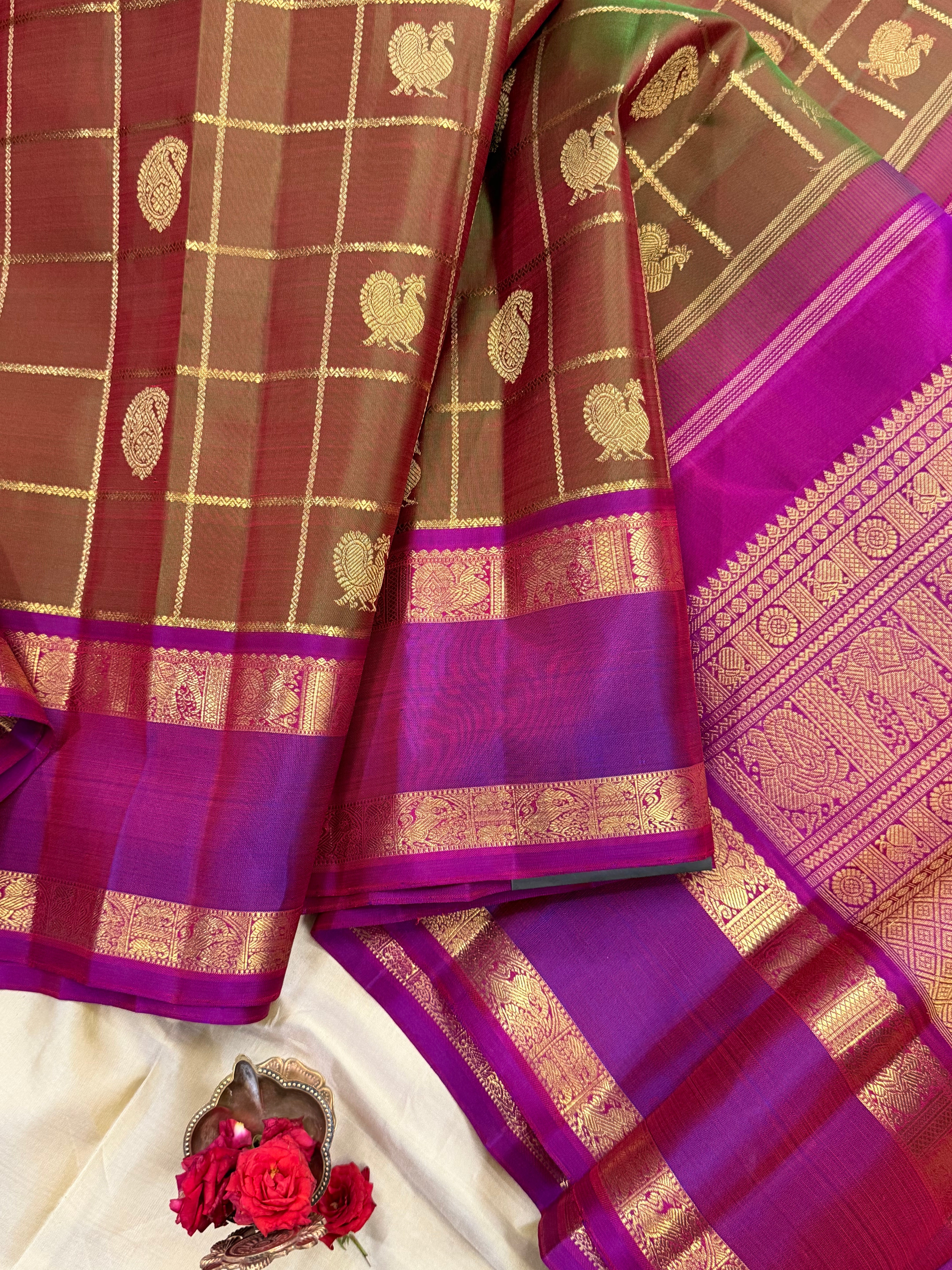 Mann : manthulir  Kattam earthy hues in pure Zari Kanjipuram silk