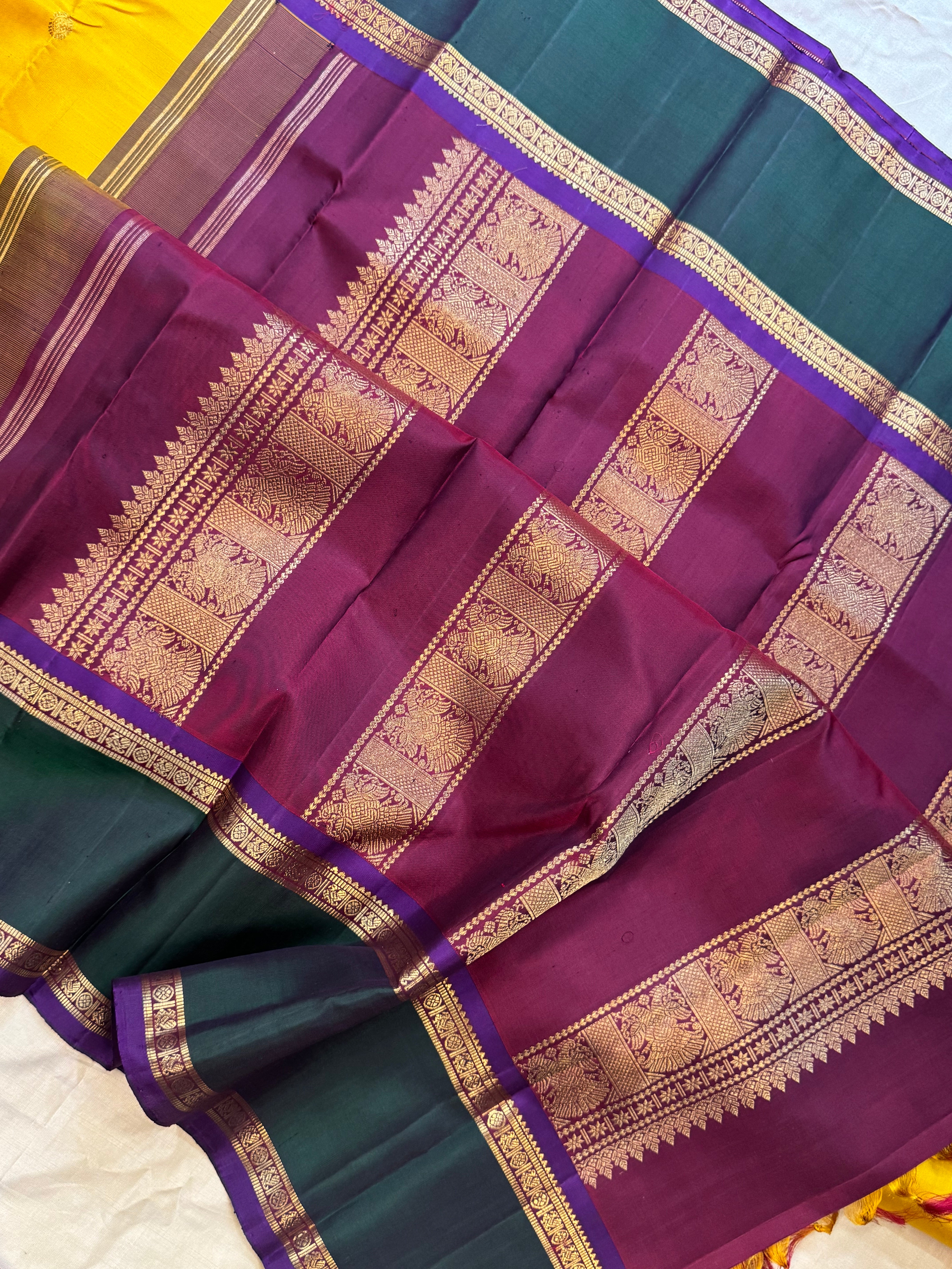 Golden yellow Korvai kanjipuram silk.