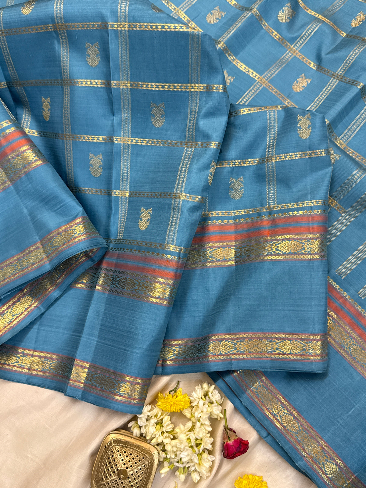 Master weaver- pastel powder blue kattam Iruthalaipakshi butta adai woven/ Kanjipuram silk