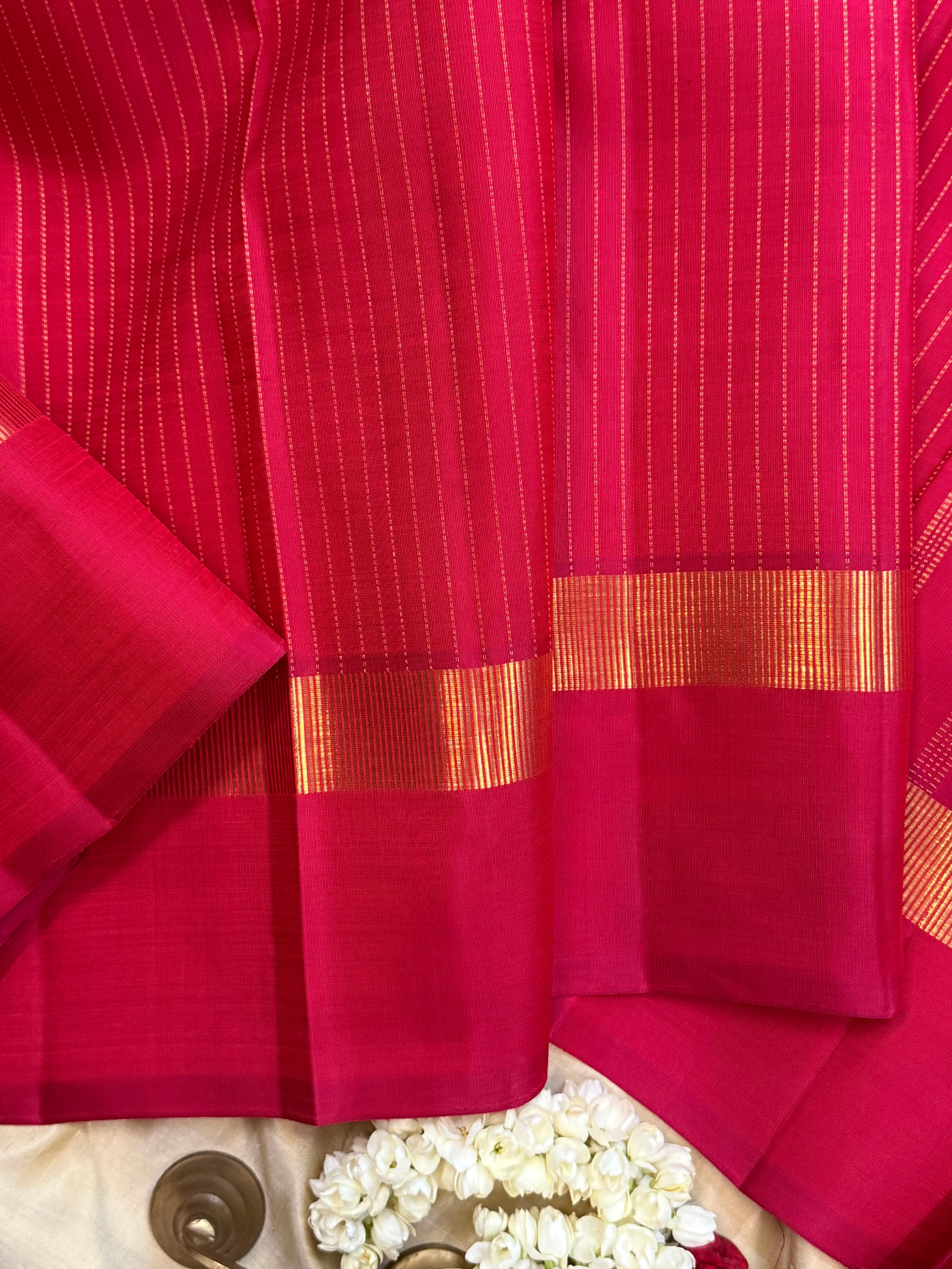 Pinkish red oosi zari lines kaal erangina border/ Kanjipuram silk