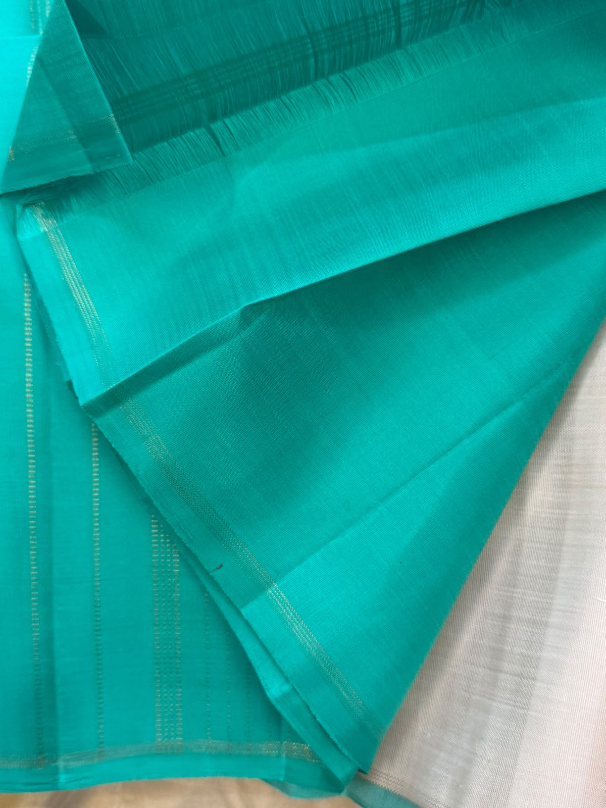 Offwhite and turquoise green borderless/ Kanjipuram silk CL9776